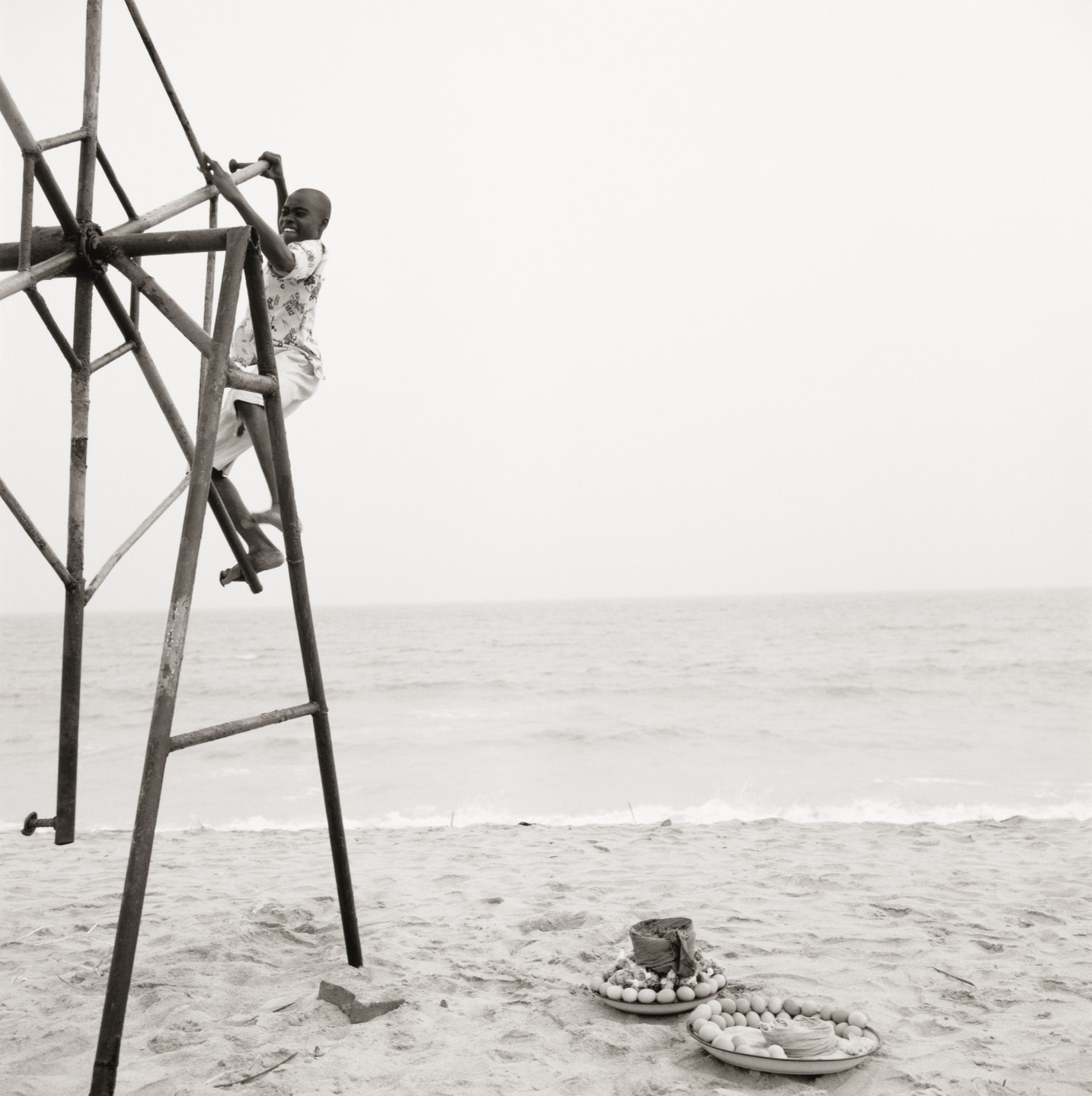 Akinbode Akinbiyi. Bar Beach, Victoria Island, Lagos from the series Sea Never Dry. 2001