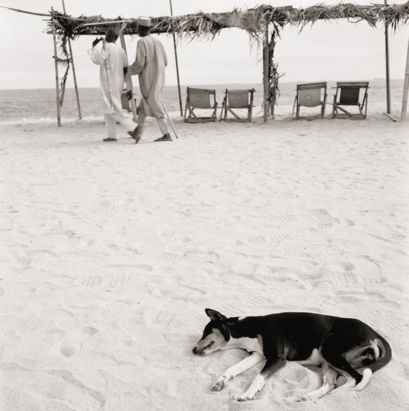 Akinbode Akinbiyi. Bar Beach, Victoria Island, Lagos from the series Sea Never Dry. 2003