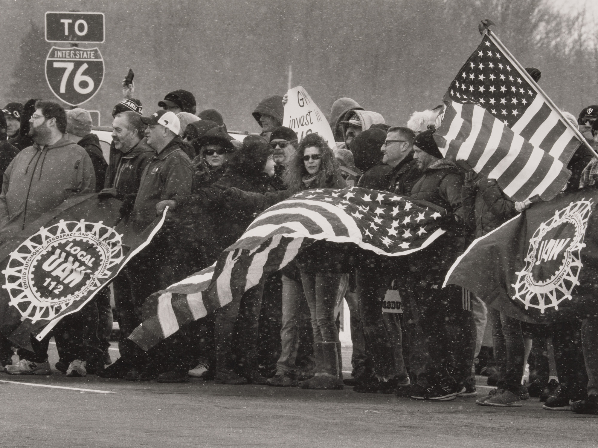 LaToya Ruby Frazier. United Auto Workers, Locals 1112 and 1714, stand-ing at the intersection of Ellsworth Bailey Road, Hallock Young Road, and I-80 Ohio Turnpike toll road entrance on March 8th, Lordstown, OH