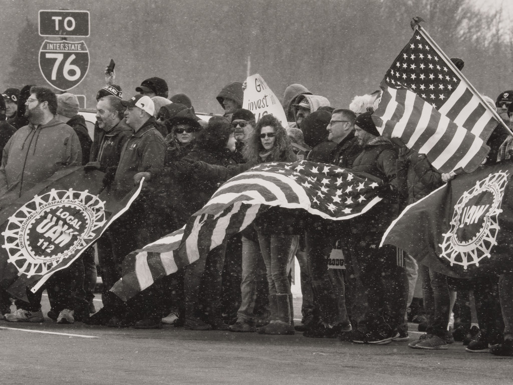 United Auto Workers, Locals 1112 and 1714, stand-ing at the intersection of Ellsworth Bailey Road, Hallock Young Road, and I-80 Ohio Turnpike toll road entrance on March 8th, Lordstown, OH