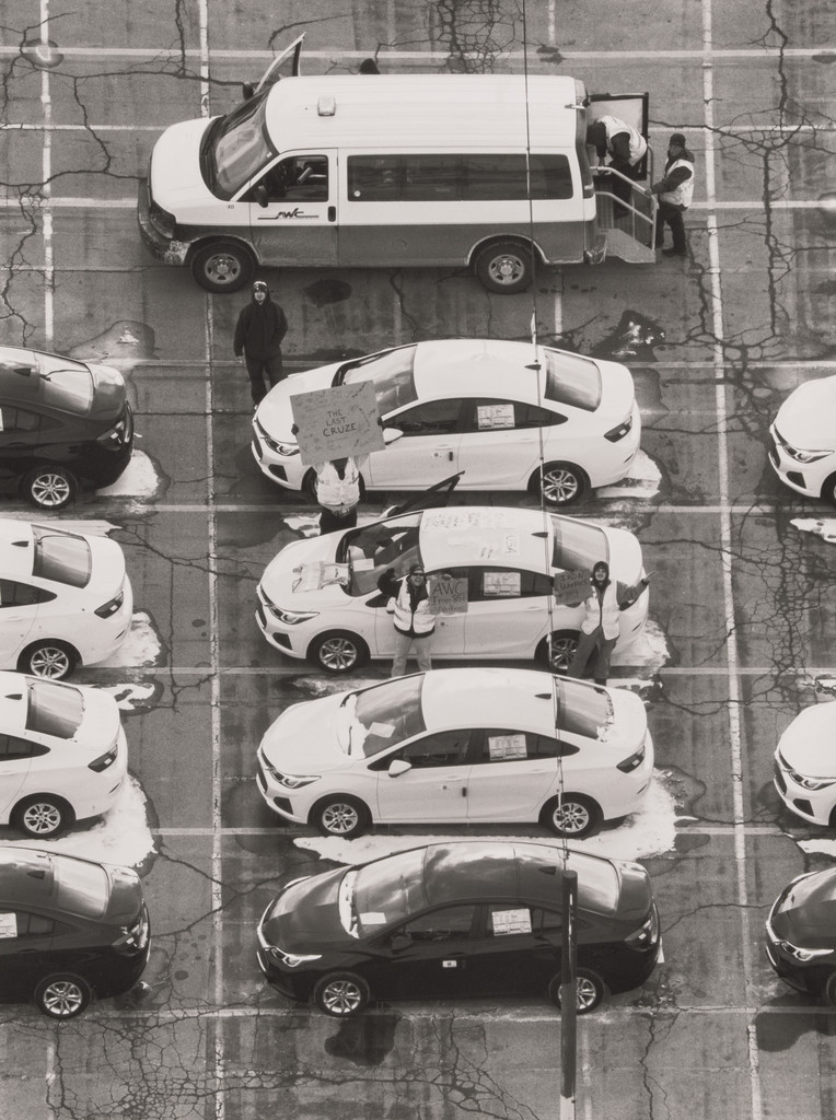 Mindy Miller, Iron Workers Union Local 851, standing with fellow iron workers and the last Chevrolet Cruze compact sedan in the GM Lordstown Complex, (11 years in at Auto Warehouse Company (AWC)), Lordstown, OH