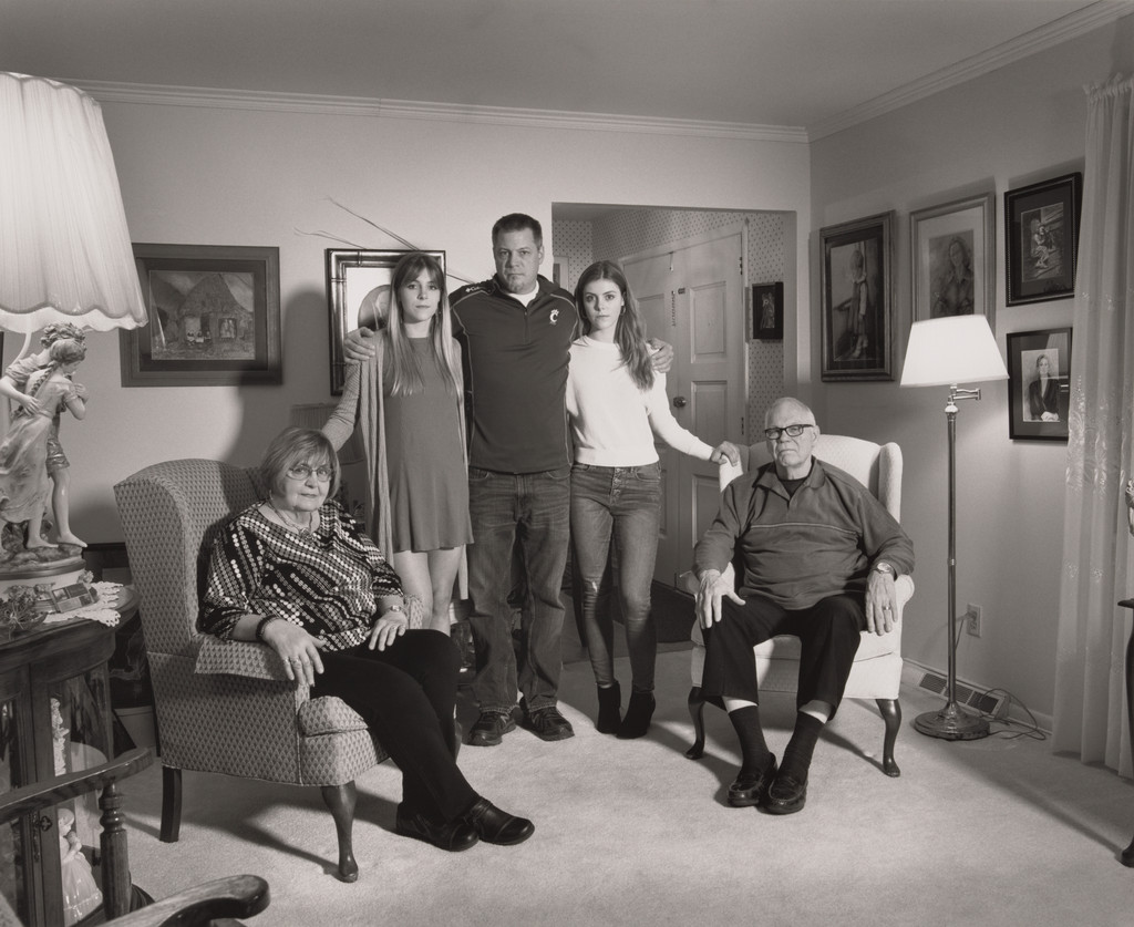 David Green, UAW Local 1112, President, in his parents’ living room with his daughters Alison and Cate, and parents Elaine and Roger, (24 years in at GM Lordstown Complex, Chassis three), Girard, OH, 2019 from The Last Cruze