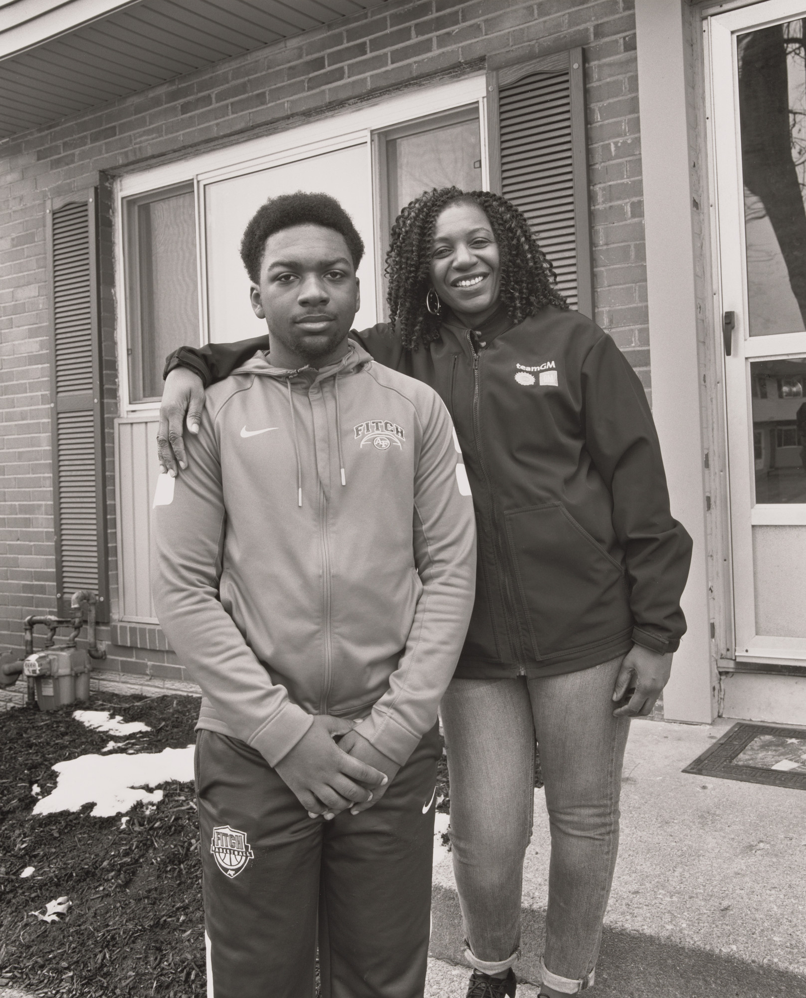 LaToya Ruby Frazier. RaNeal Edwards, UAW Local 1112, Guide and Women’s Committee, with her son Allison III at home, (24 years total between four GM plants, 9 years in at GM Lordstown Complex, final pro-cess), Austintown, OH.