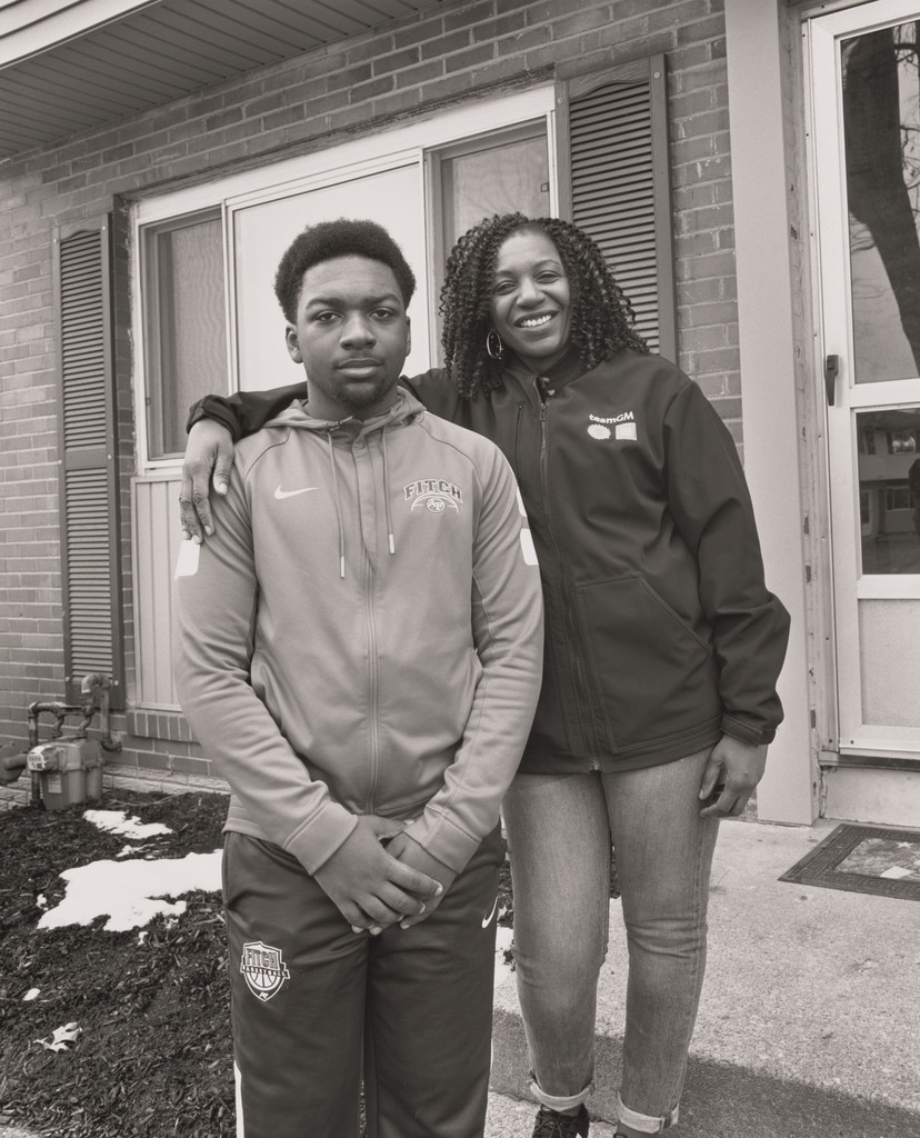 RaNeal Edwards, UAW Local 1112, Guide and Women’s Committee, with her son Allison III at home, (24 years total between four GM plants, 9 years in at GM Lordstown Complex, final pro-cess), Austintown, OH.