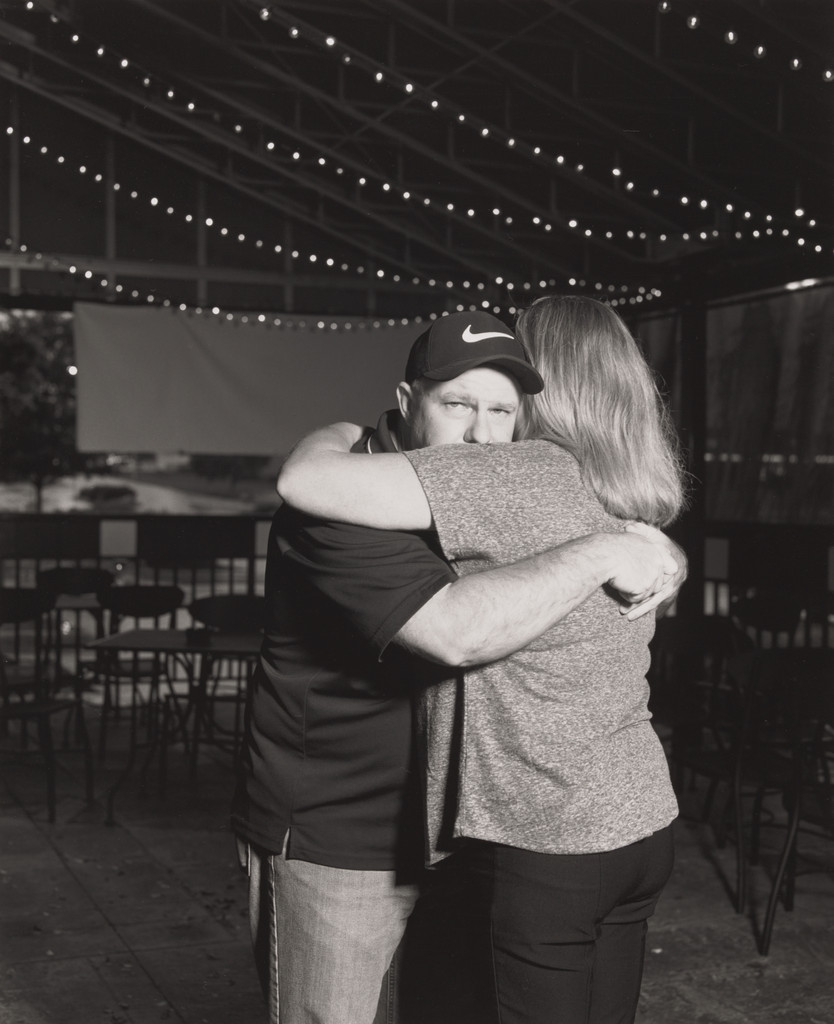 John Davies, Jr., UAW Local 1112, Sergeant at Arms, hugging his wife Shelby at his going away party at Buffalo Wild Wings, (12 years in at GM Lordstown Complex, chassis and trim shop), Austintown, OH.