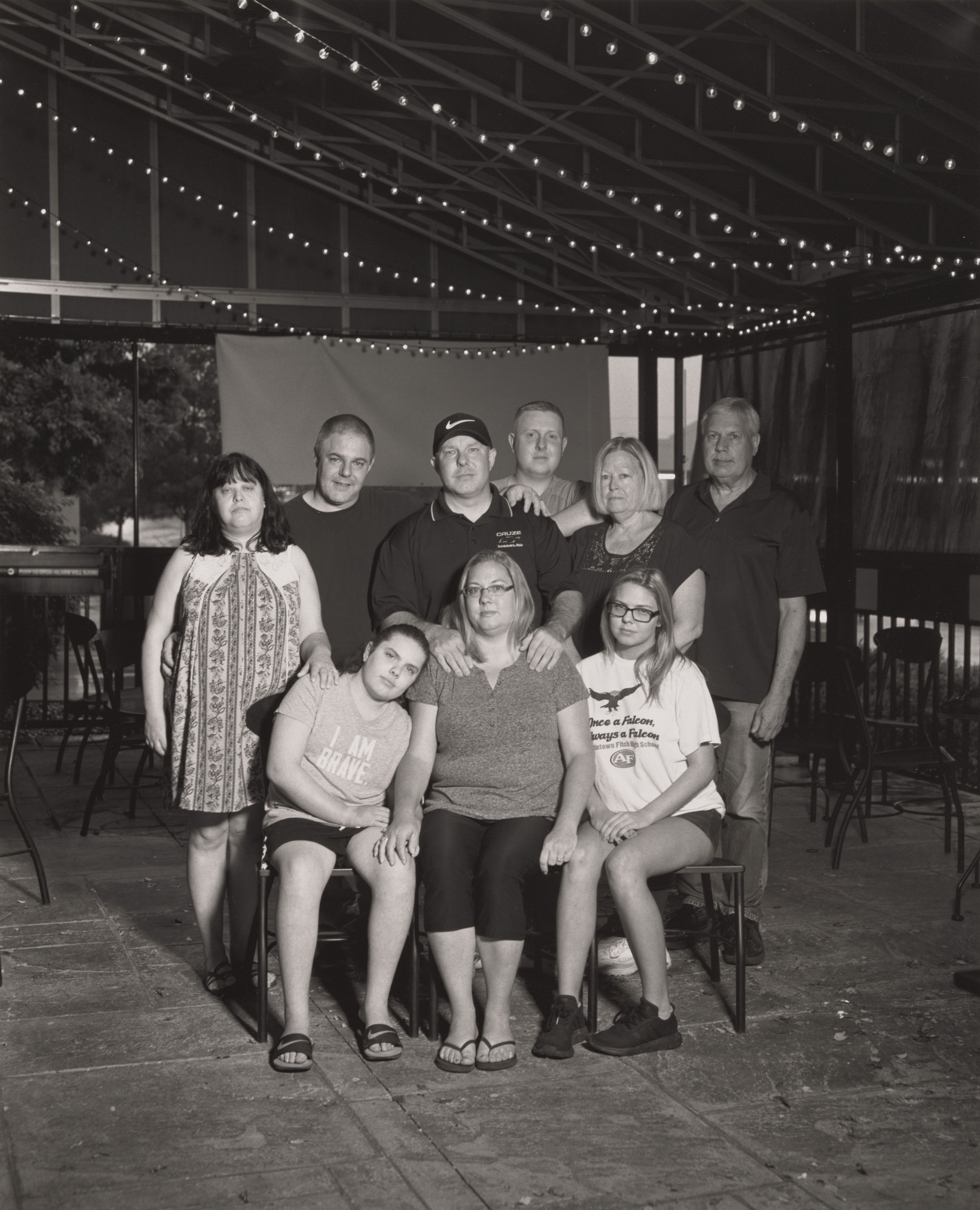LaToya Ruby Frazier. John Davies, Jr., UAW Local 1112, Sergeant at Arms, standing with his family members: daughters Ava and Keegan, his wife Shelby, his son Noah, his brother Mike, his sister-in-law Tina, and his parents-in-law Tom and Cindy Flick at Buffalo Wild Wings, Austintown, OH.