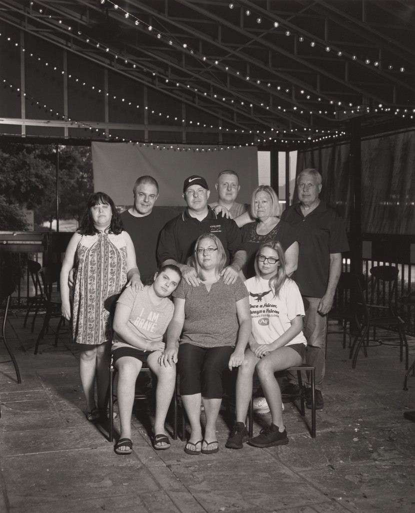 John Davies, Jr., UAW Local 1112, Sergeant at Arms, standing with his family members: daughters Ava and Keegan, his wife Shelby, his son Noah, his brother Mike, his sister-in-law Tina, and his parents-in-law Tom and Cindy Flick at Buffalo Wild Wings, Austintown, OH.