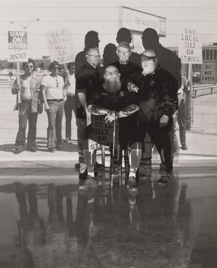 Dan Adams, UAW Local 1112, Trustee, with his father and brothers, Eugene (Red) Adams, Eugene Jr. (Andy) Adams, and Bill Adams with an image of UAW Pickets at Lordstown in 1974, inside UAW Local 1112 Reuther Scandy Alli union hall, Lordstown, OH.