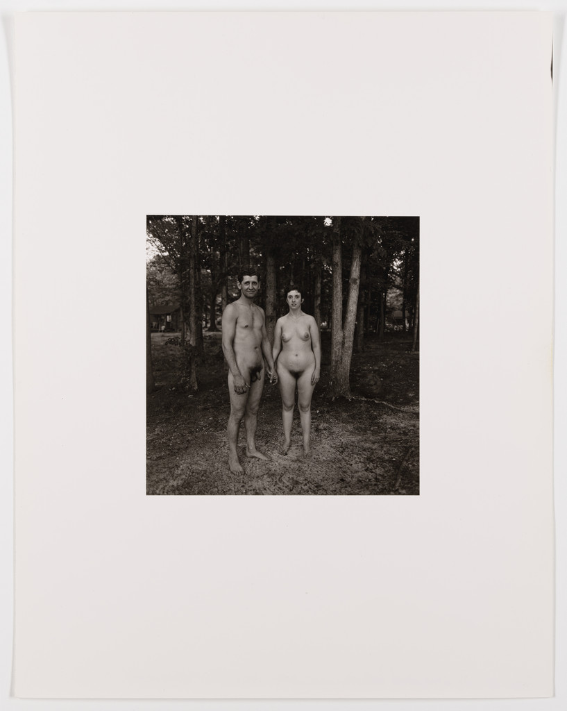 Man and wife in the woods, evening, nudist camp, N.J., 1963