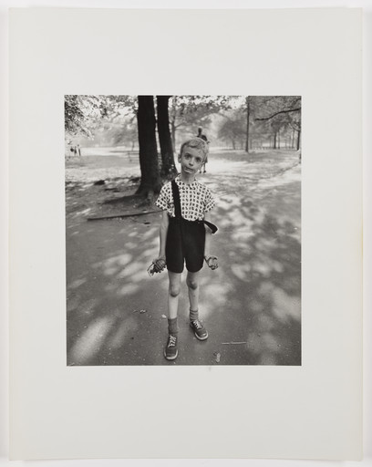 Child with a toy hand grenade in Central Park, N.Y.C., 1962