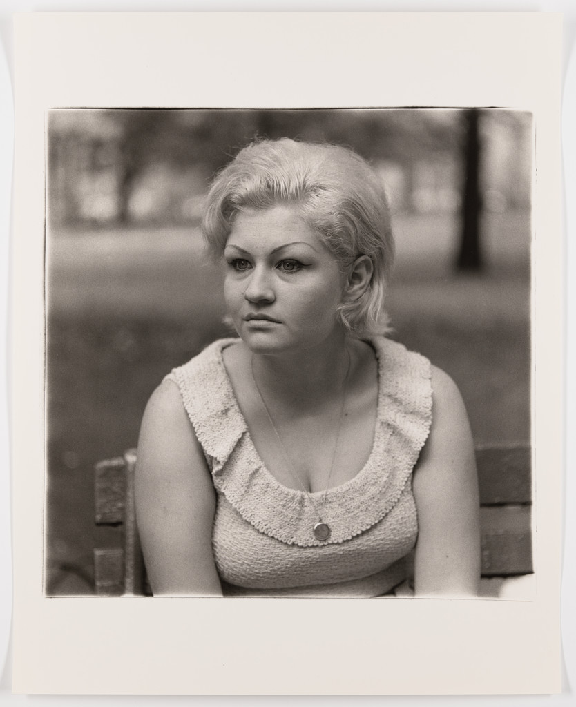 Woman with a locket in Washington Square Park, N.Y.C., 1965