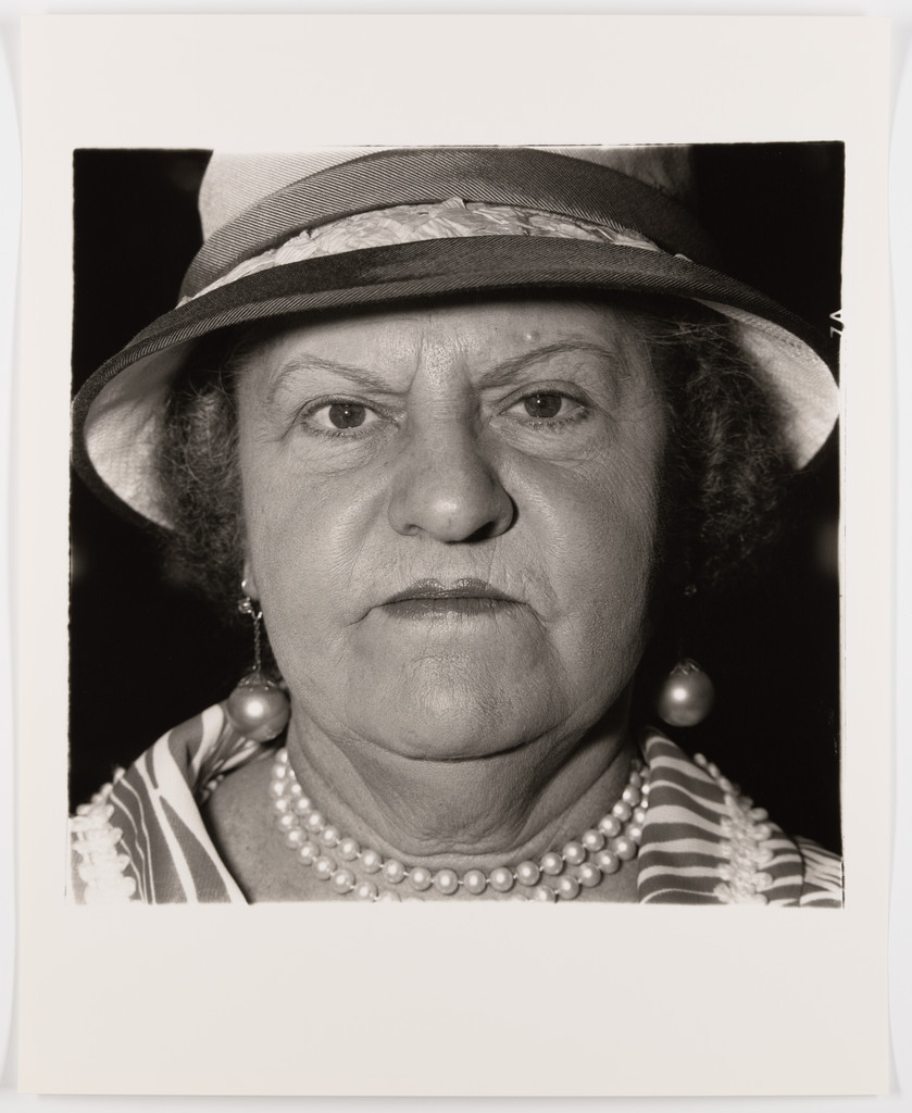 Woman with pearl necklace and earrings, N.Y.C., 1967