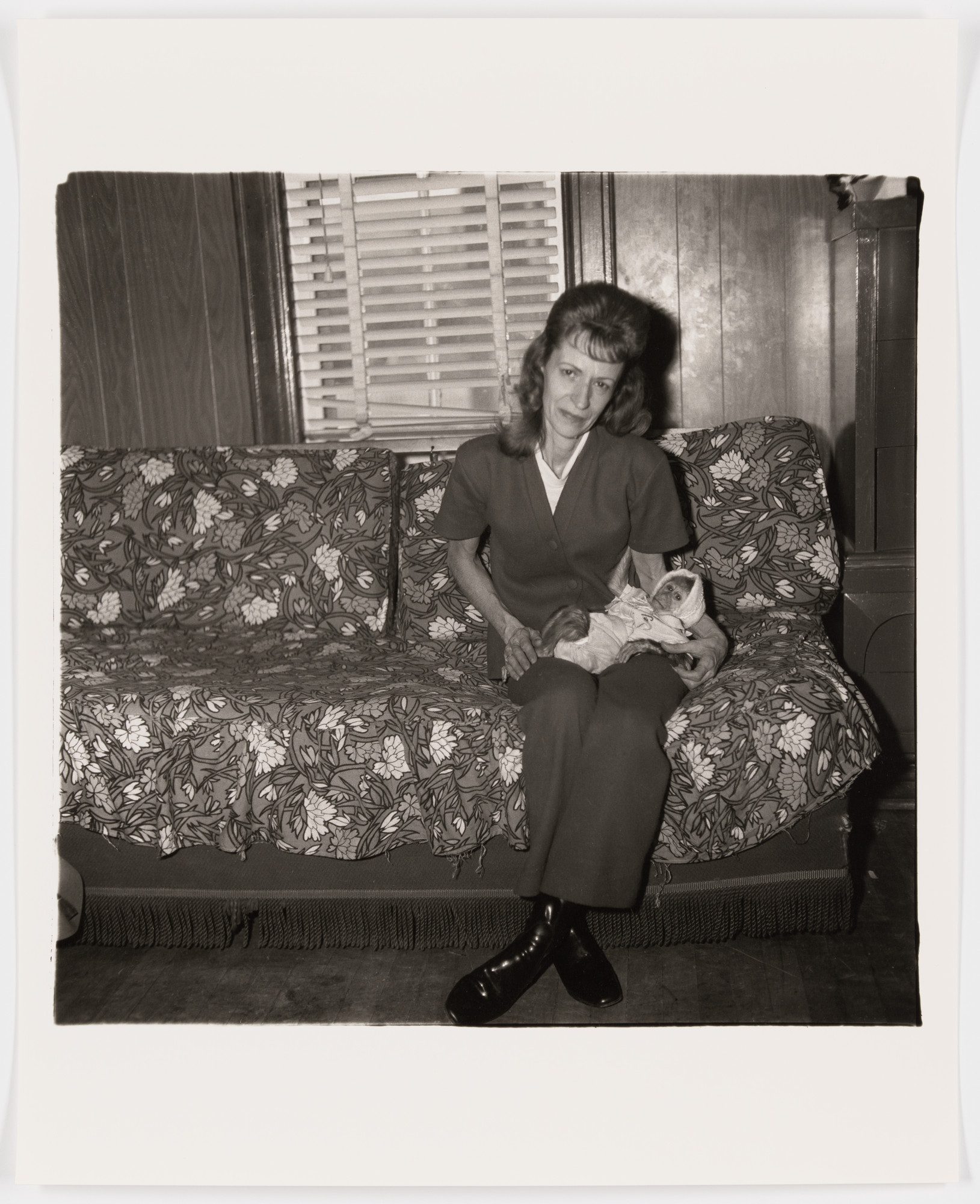 Diane Arbus. A woman with her baby monkey, N.J., 1971. 1971 | MoMA