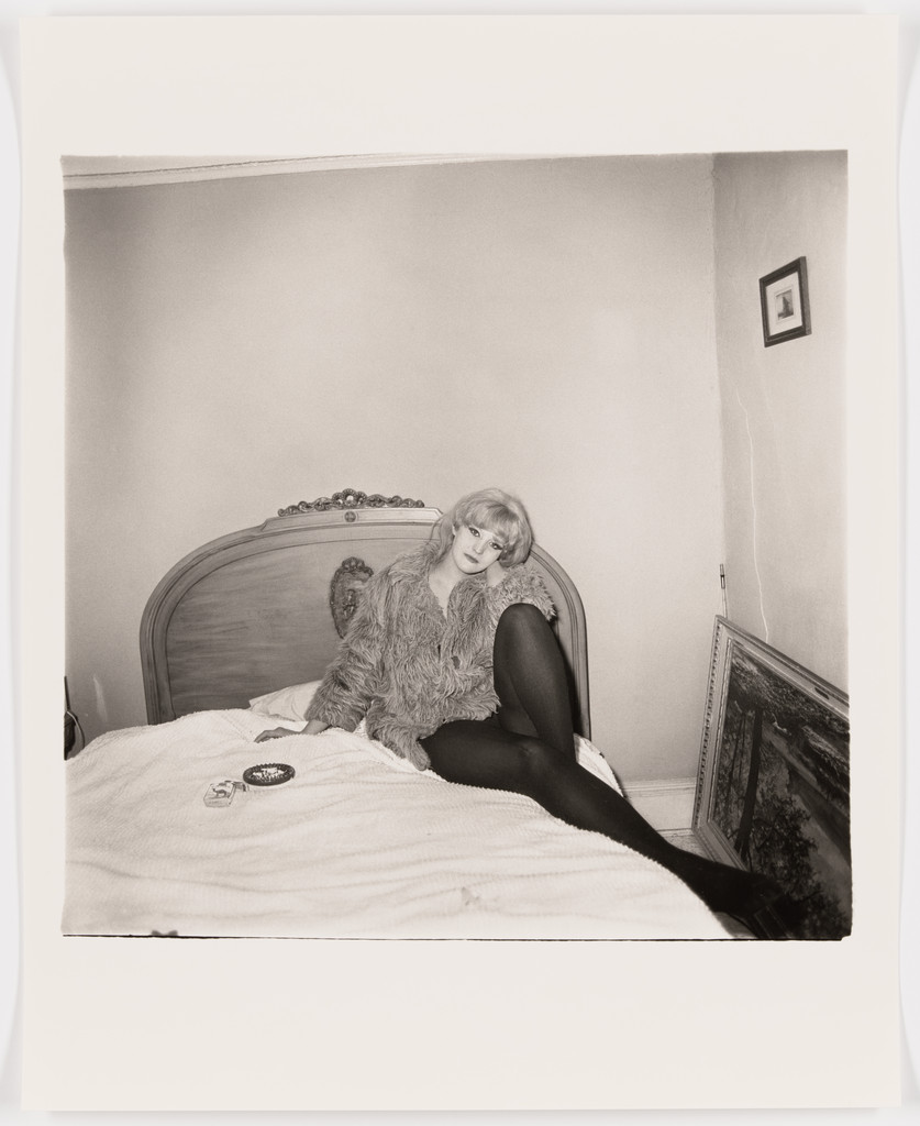 Girl in a coat lying on her bed, N.Y.C., 1968, Diane Arbus, 1968