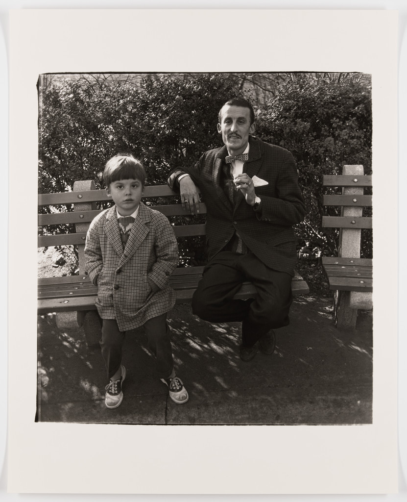 Man and a boy on a bench in Central Park, N.Y.C., 1962