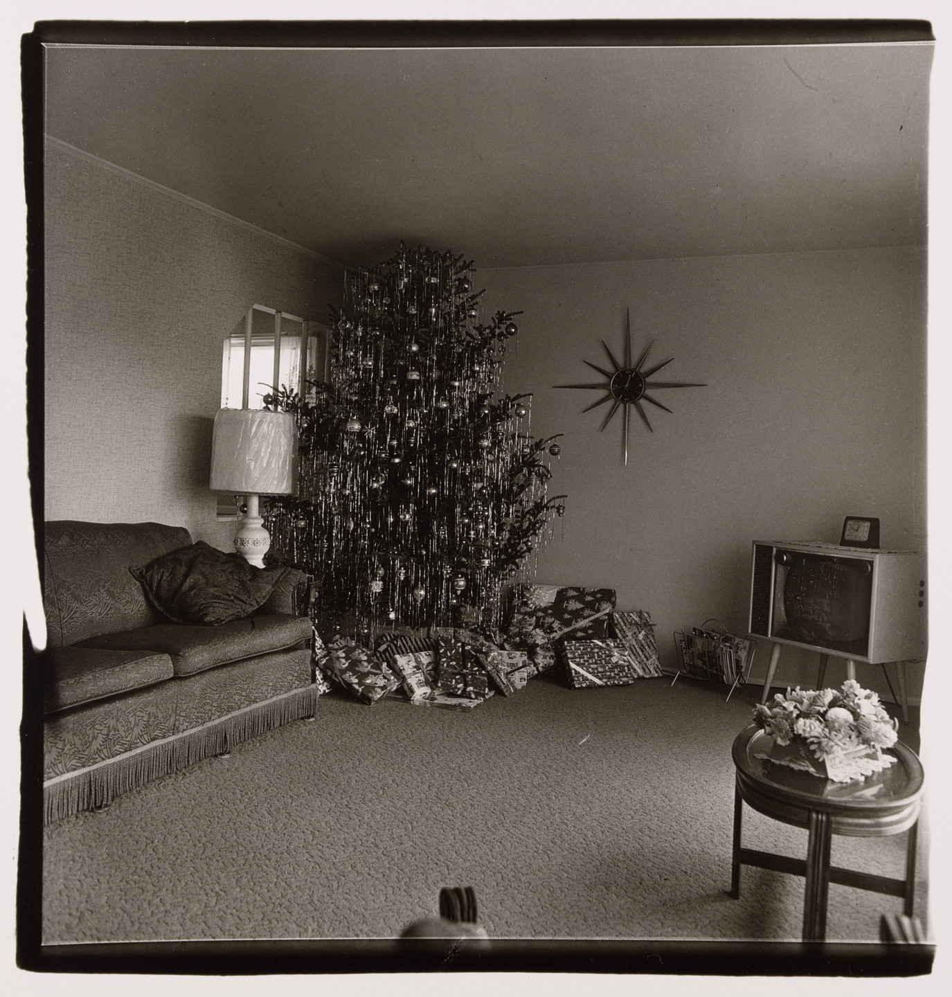 Diane Arbus. Xmas tree in a living room in Levittown, Long Island, 1963. 1963