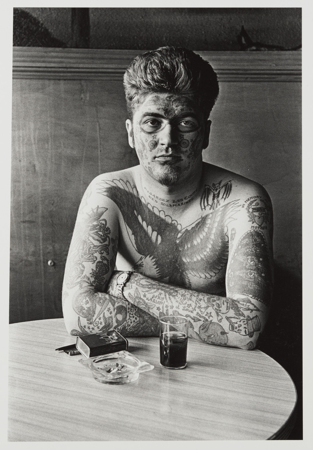 Diane Arbus. Jack Dracula at a bar, New London, Connecticut. 1961