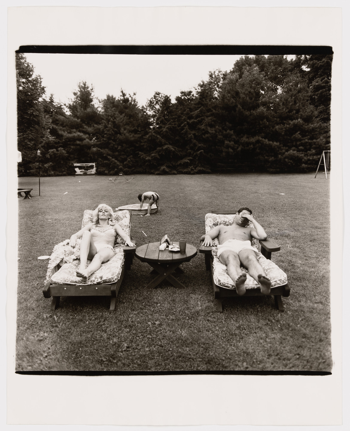 Diane Arbus. A family on the lawn in Westchester on a Sunday, N.Y., 1968. 1968