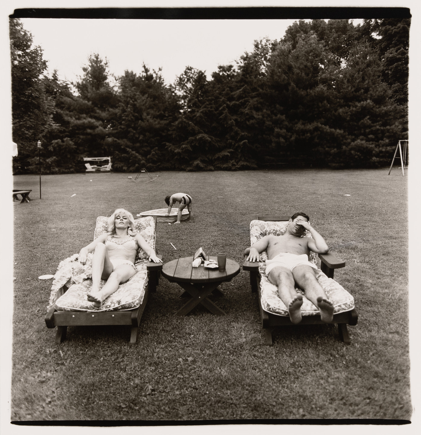 Diane Arbus. A family on the lawn in Westchester on a Sunday, N.Y., 1968. 1968