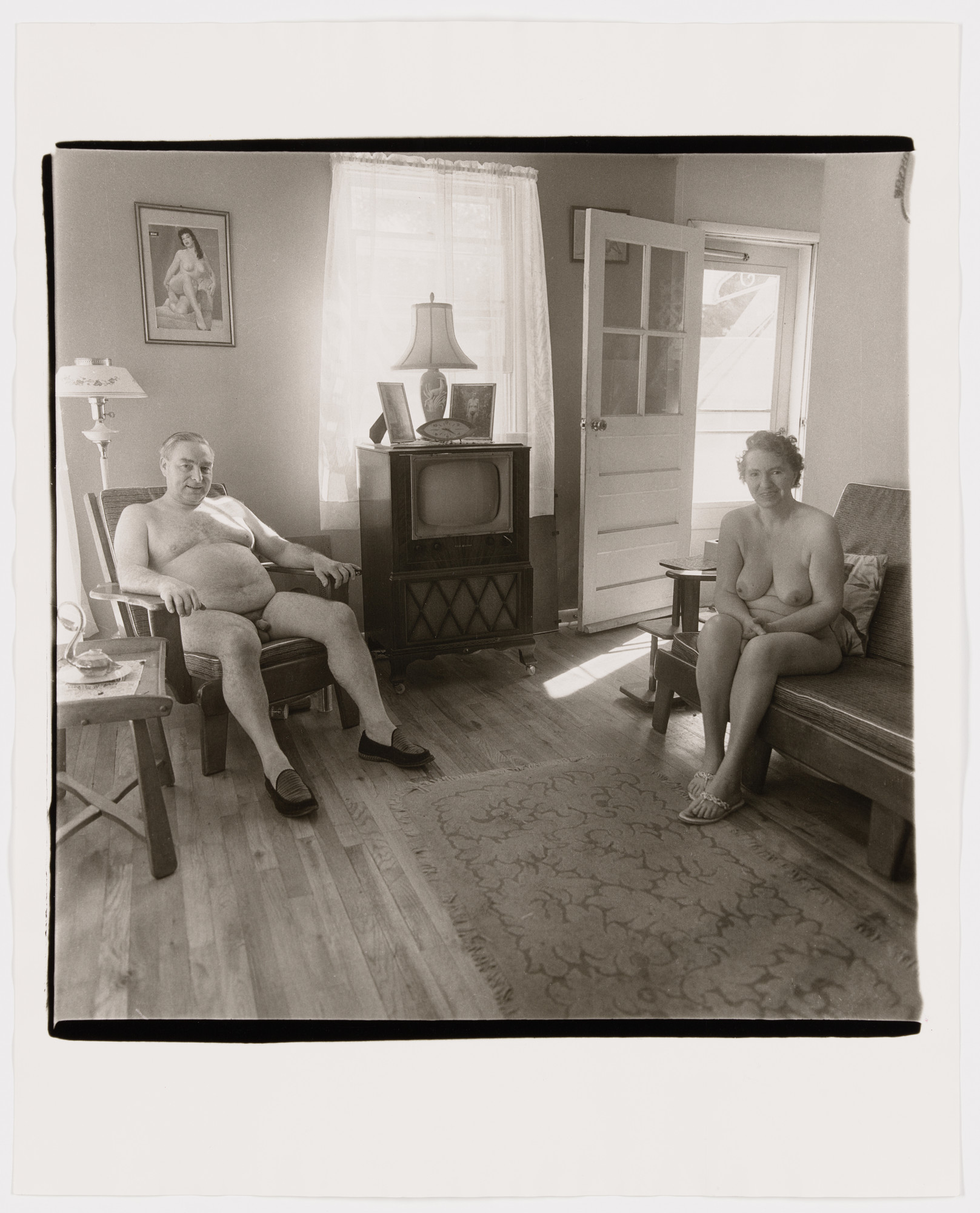 Diane Arbus. Retired man and his wife at home in a nudist camp one morning, N.J., 1963