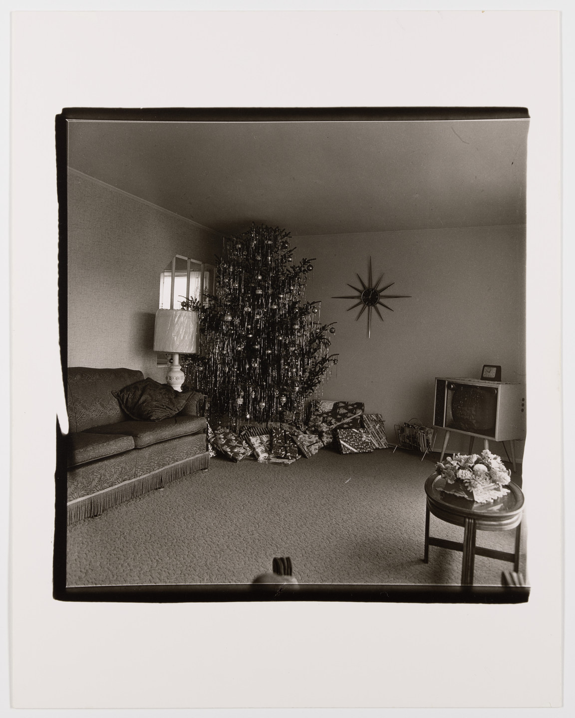 Diane Arbus. Xmas tree in a living room in Levittown, Long Island, 1963. 1963