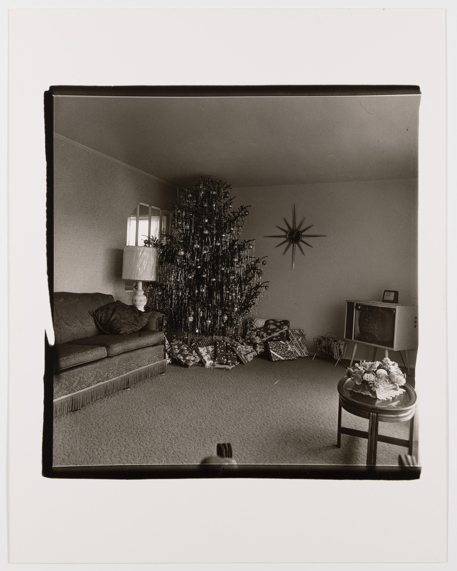 Diane Arbus. Xmas tree in a living room in Levittown, Long Island, 1963