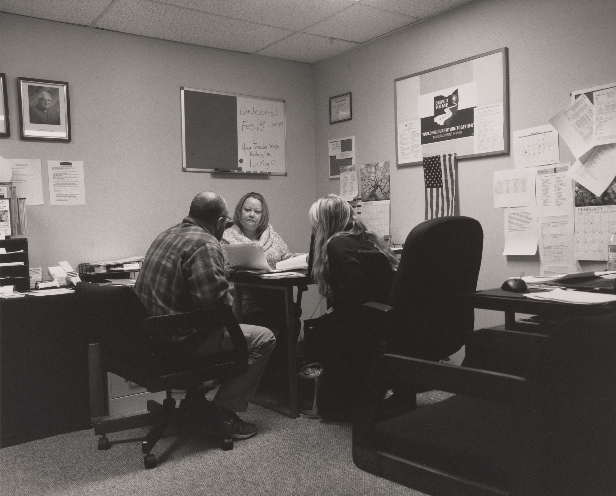 LaToya Ruby Frazier. Customer service representatives Christina Defelice and Angela Ralston preparing paperwork for a co-worker after his shift in the Transition Center at UAW Local 1112 Reuther Scandy Alli union hall, Lordstown, OH