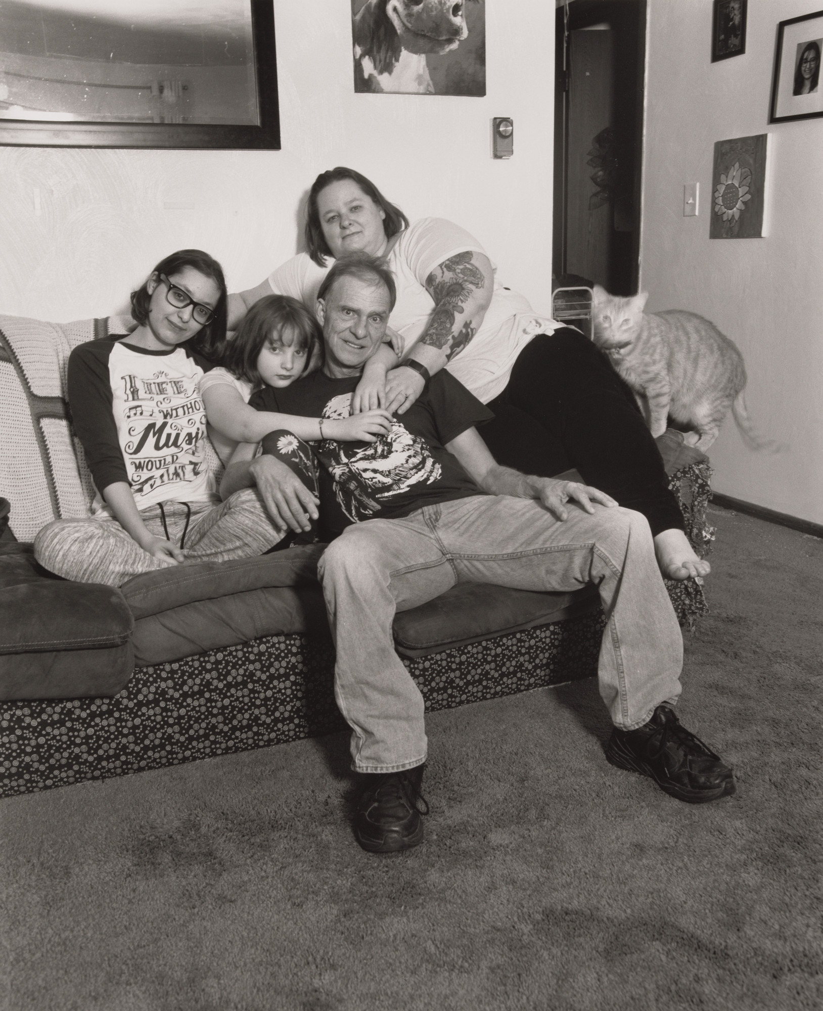 LaToya Ruby Frazier. Trisha Amato, UAW Local 1112, at home with her boyfriend Michael Leonard and her two daughters Bayley and
Madison, (Transition Center Customer Service Representative, 11 years in at GM Lordstown Complex, trim shop), Poland OH.