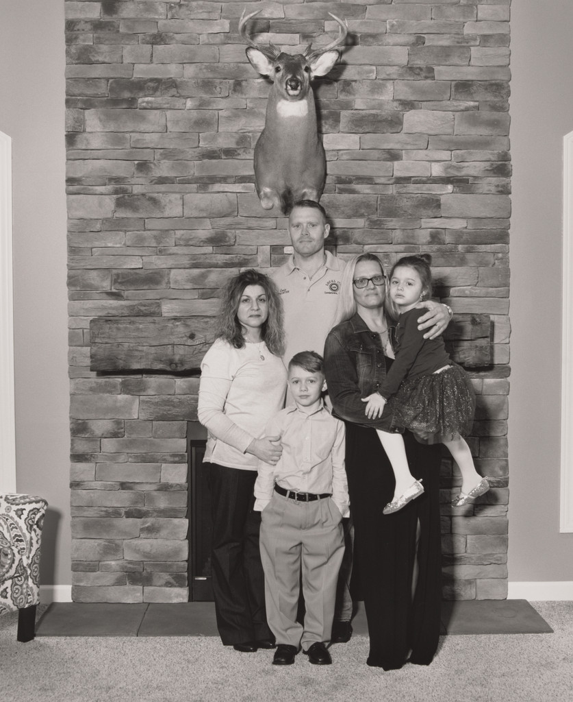 Ernie Long, UAW Local 1714, Trustee, with his wife Eydokia, their children Christian and Mia, and his sister Brandie in front of his custom-designed fireplace, (11 years in at GM Lordstown Complex, press room team leader), Highland Township, OH.