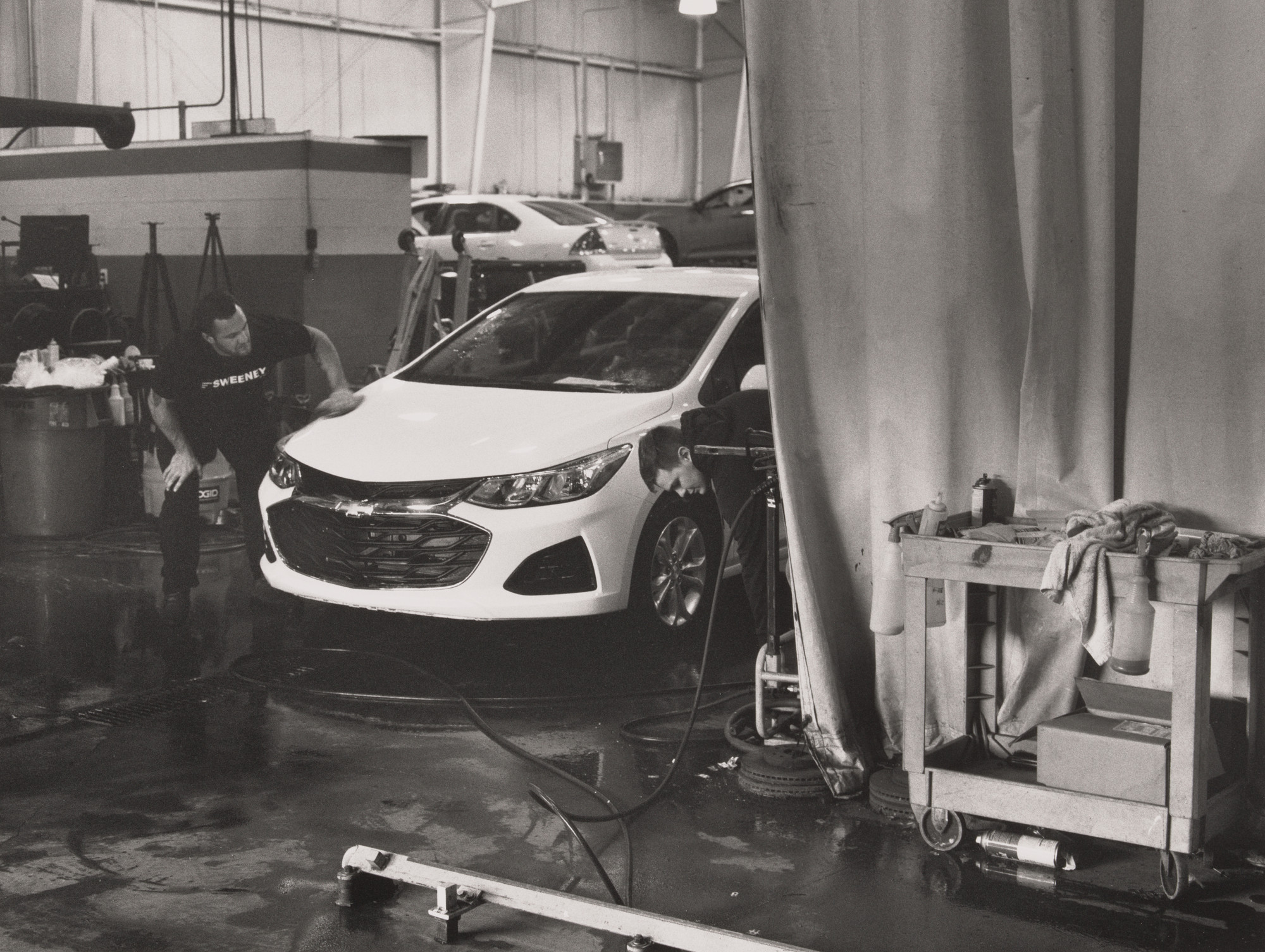LaToya Ruby Frazier. The last Cruze being detailed by Ron Davis at Sweeney Chevrolet Buick GMC car dealership in Boardman, OH, 2019