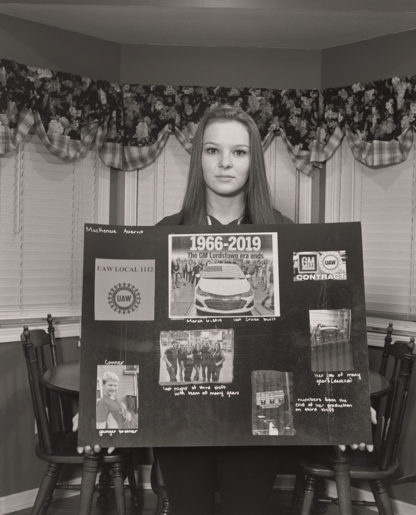 Mackenzie Acierno, Trisha Brown’s daughter, a junior at Canfield High School, holding her prop for her speech on the idled status of GM Lord-stown Complex, Youngstown, OH., LaToya Ruby Frazier, 2019
