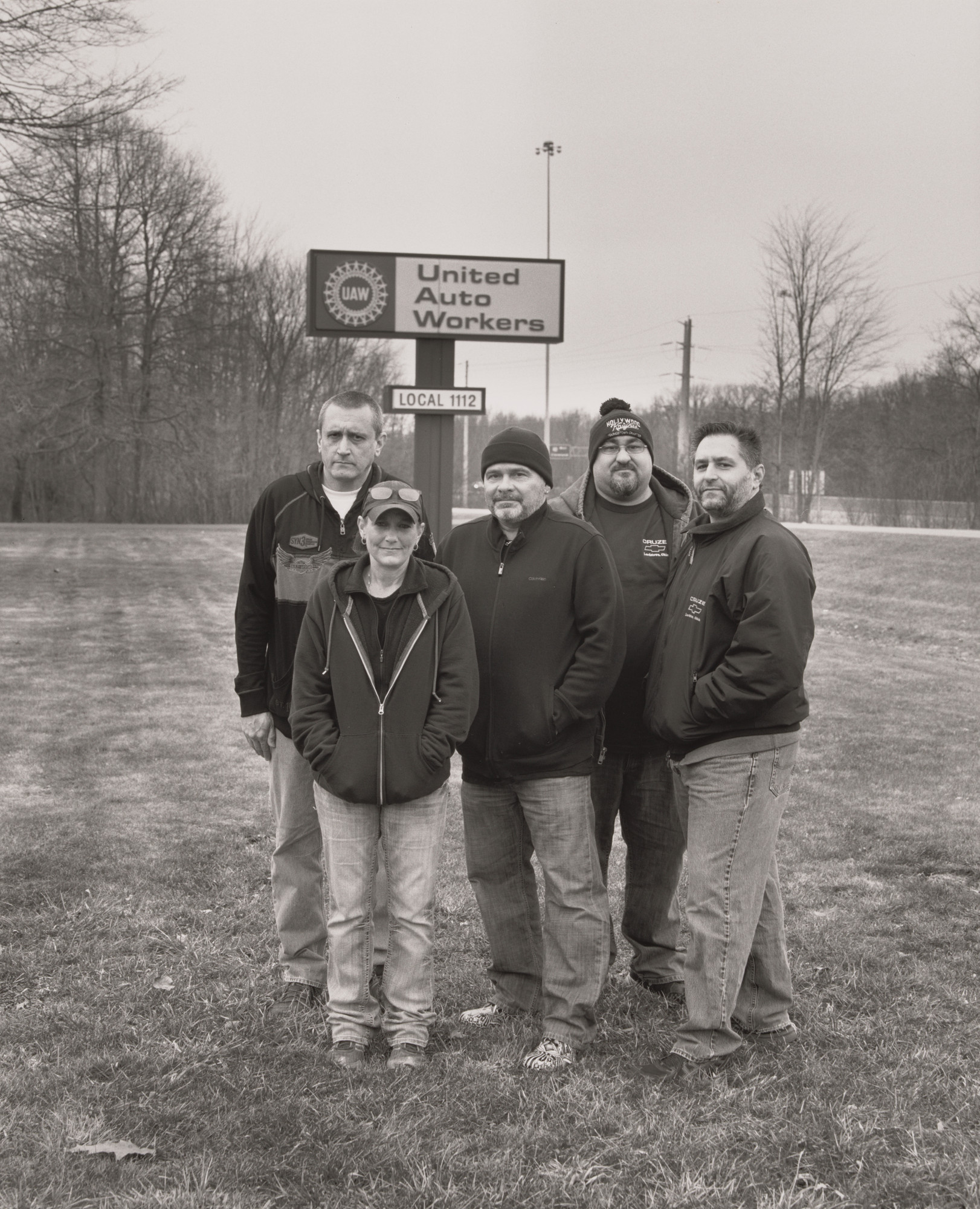 LaToya Ruby Frazier. United Auto Workers Local 1112 members standing together outside the Reuther Scandy Alli union hall on
Reuther Drive: Ken Mitchell (24 years in at GM Lordstown Complex, paint shop), Vickie Raymond (24 years in at GM Lordstown Complex, paint shop), Donny Componation (22 years in at GM Lordstown Complex, paint shop), Sam Crank (19 years in at GM Lordstown Complex, chassis), Dusty DiVencie (22 years at GM Lordstown Complex, Chassis).