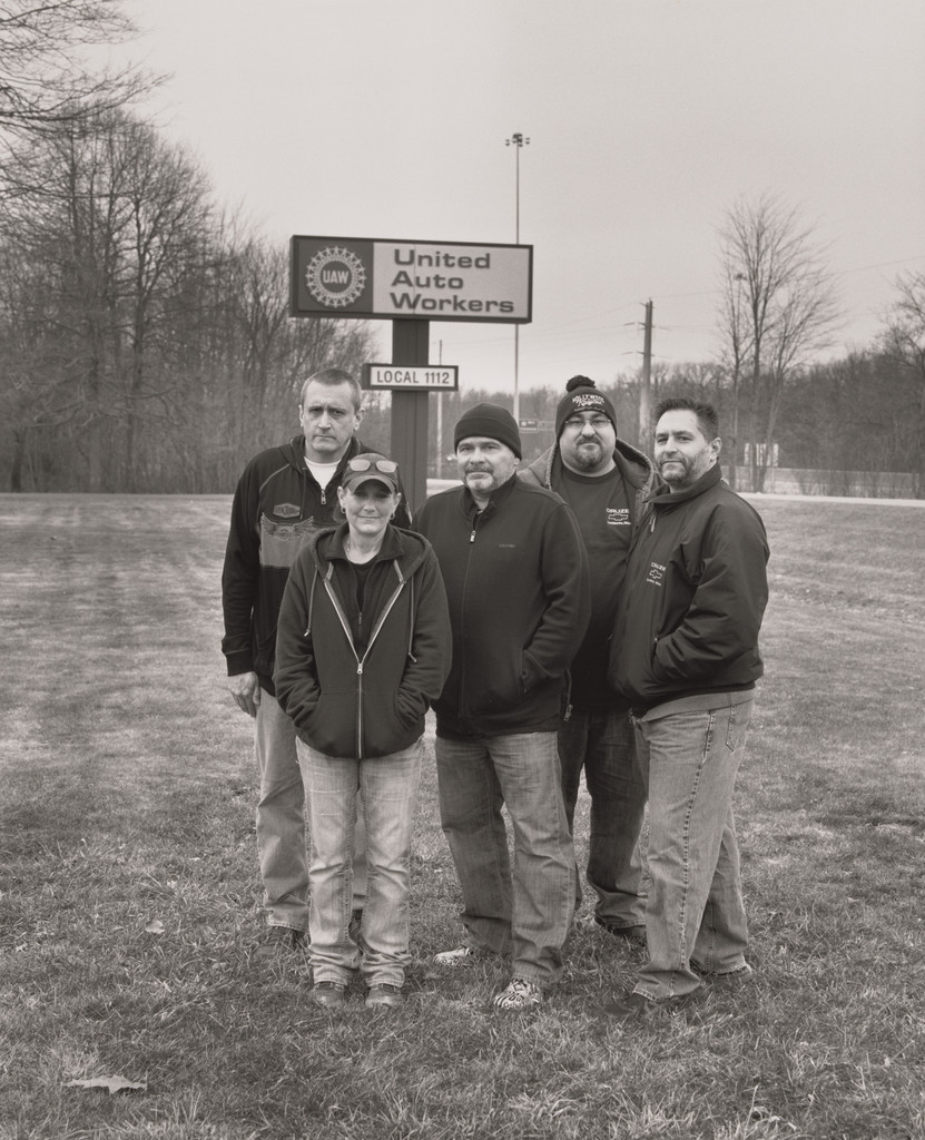 United Auto Workers Local 1112 members standing together outside the Reuther Scandy Alli union hall on, Reuther Drive: Ken Mitchell (24 years in at GM Lordstown Complex, paint shop), Vickie Raymond (24 years in at GM Lordstown Complex, paint shop), Donny Componation (22 years in at GM Lordstown Complex, paint shop), Sam Crank (19 years in at GM Lordstown Complex, chassis), Dusty DiVencie (22 years at GM Lordstown Complex, Chassis).