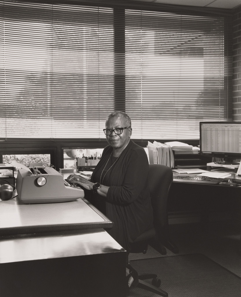 Diane Franklin, Office and Professional Employees international Union (OPEIU), inside her office typing on her, IBM Selectric II typewriter at UAW Local 1112 Reuther Scandy Alli union hall, (48 years in as UAW Local 1112 secretary), Lordstown, OH., LaToya Ruby Frazier, 2019
