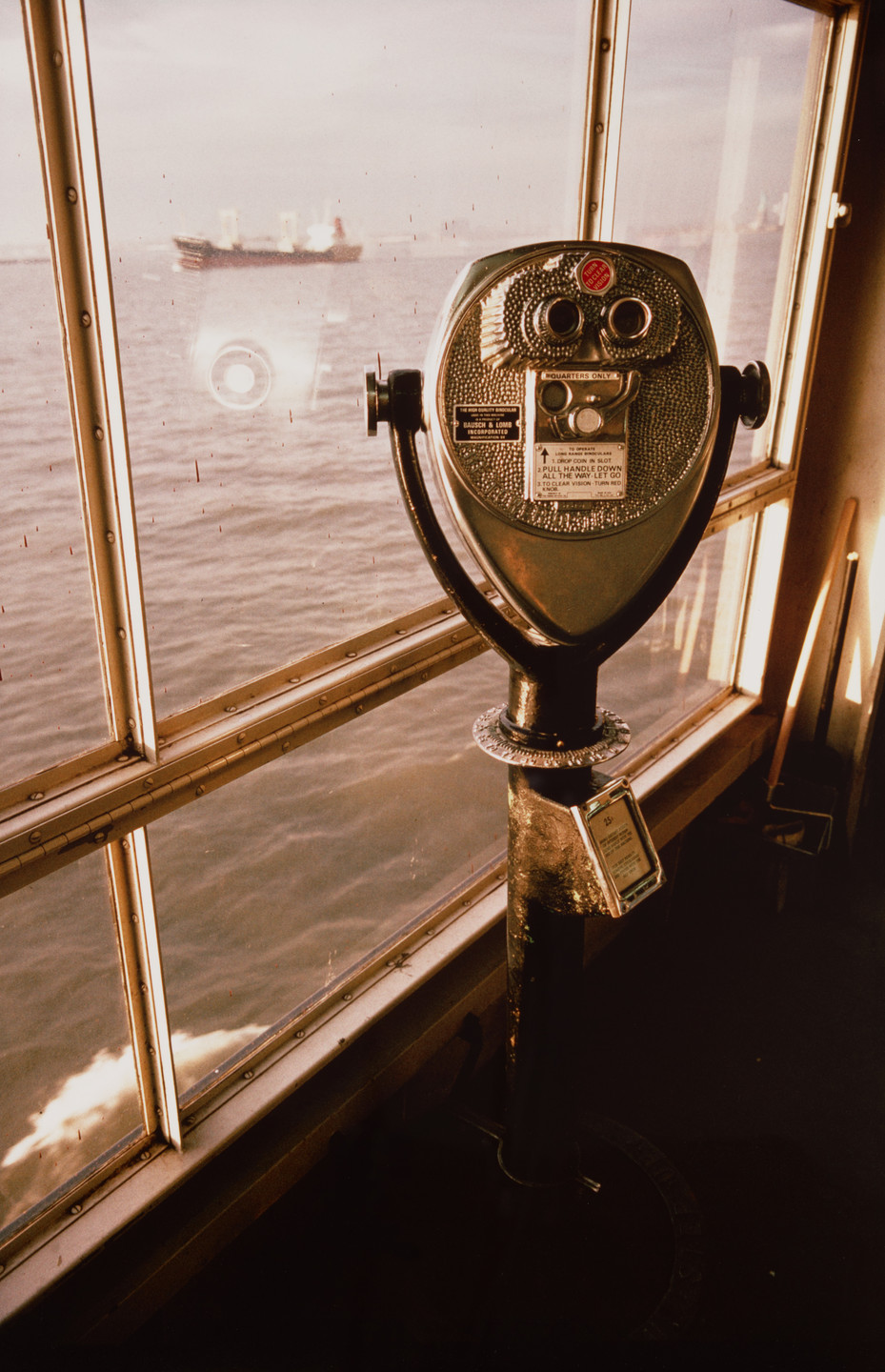 Allan Sekula. Boy looking at his mother. Staten Island Ferry. New York harbor from the series Fish Story. February 1990