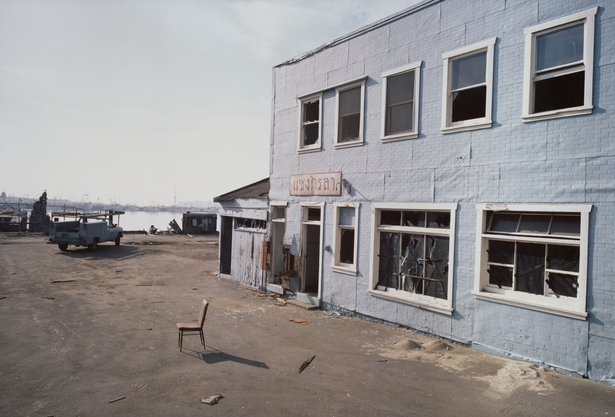 Allan Sekula. Abandoned shipyard used by Marine Corps Expeditionary Force for &#34;counter-terrorist&#34; exercises. Los Angeles harbor. Terminal Island, California from the series Fish Story. November 1992