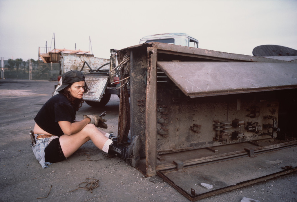 "Pancake," a former shipyard sandblaster, scavenging copper from a waterfront scrapyard. Los Angeles harbor. Terminal Island, California from the series Fish Story