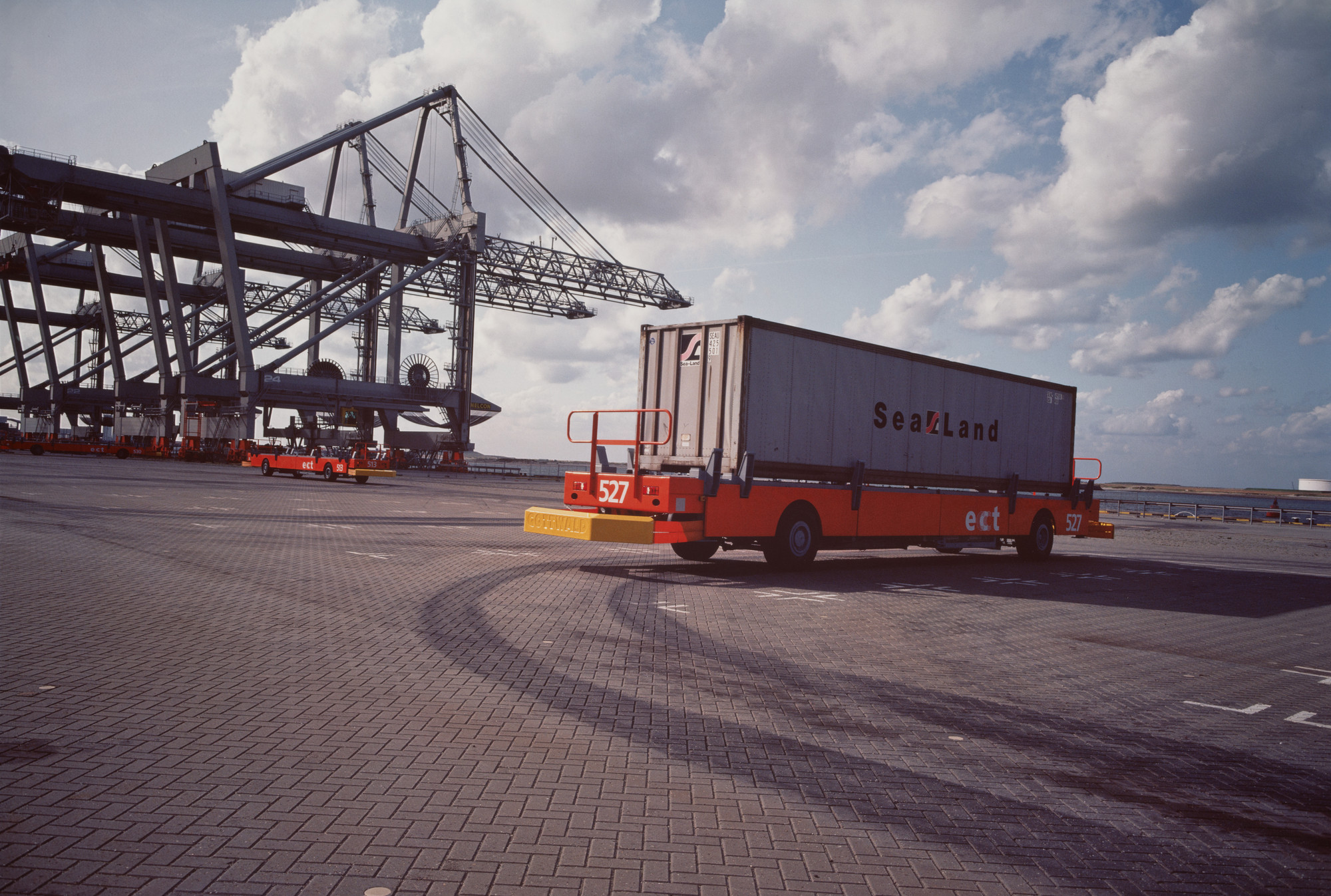 Allan Sekula. Testing robot-truck designed to move containers within automated ECT/Sea-Land cargo terminal. Maasvlakte, Port of Rotterdam, the Netherlands from the series Fish Story. September 1992