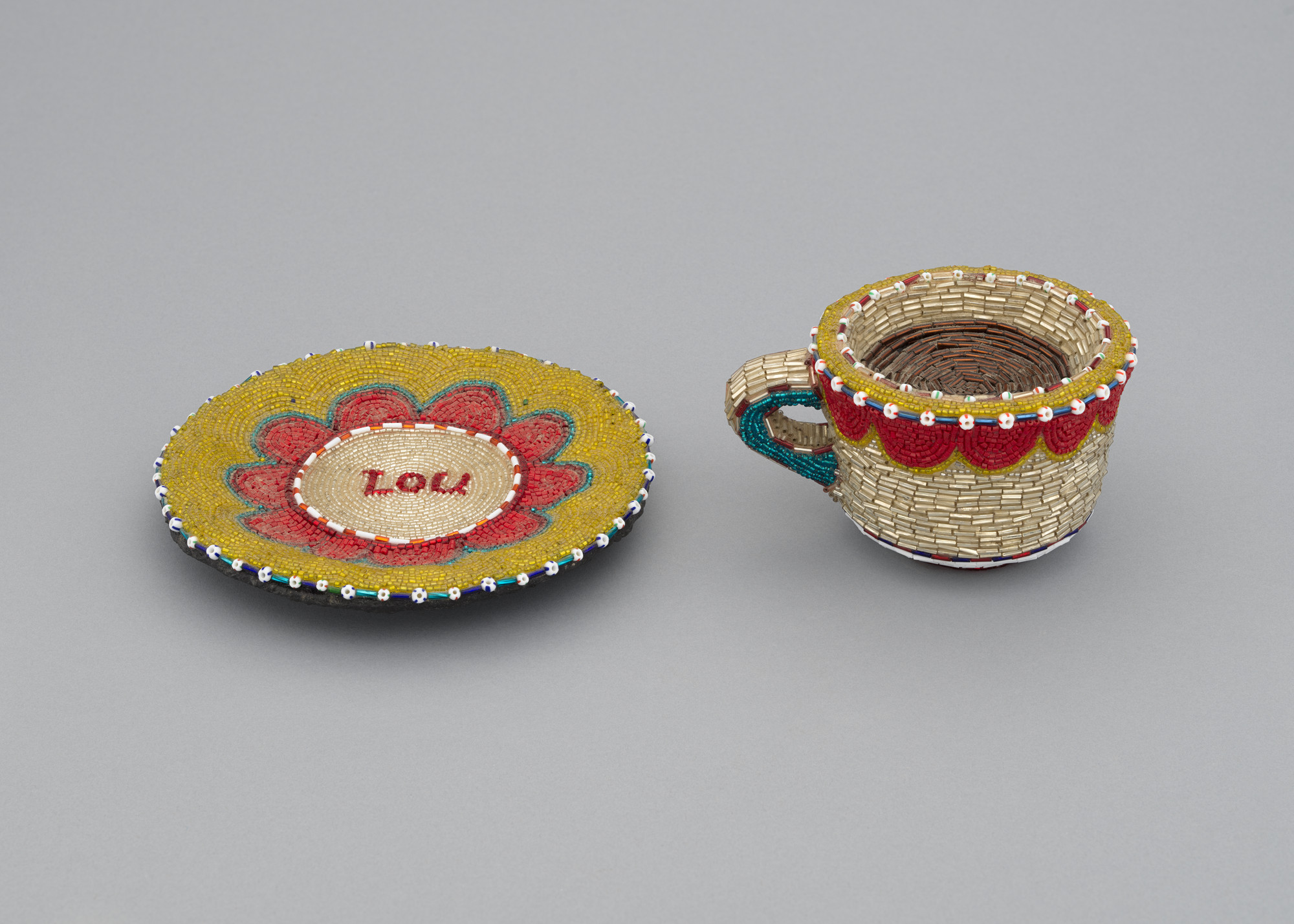 Liza Lou. Cup and Saucer. 1995