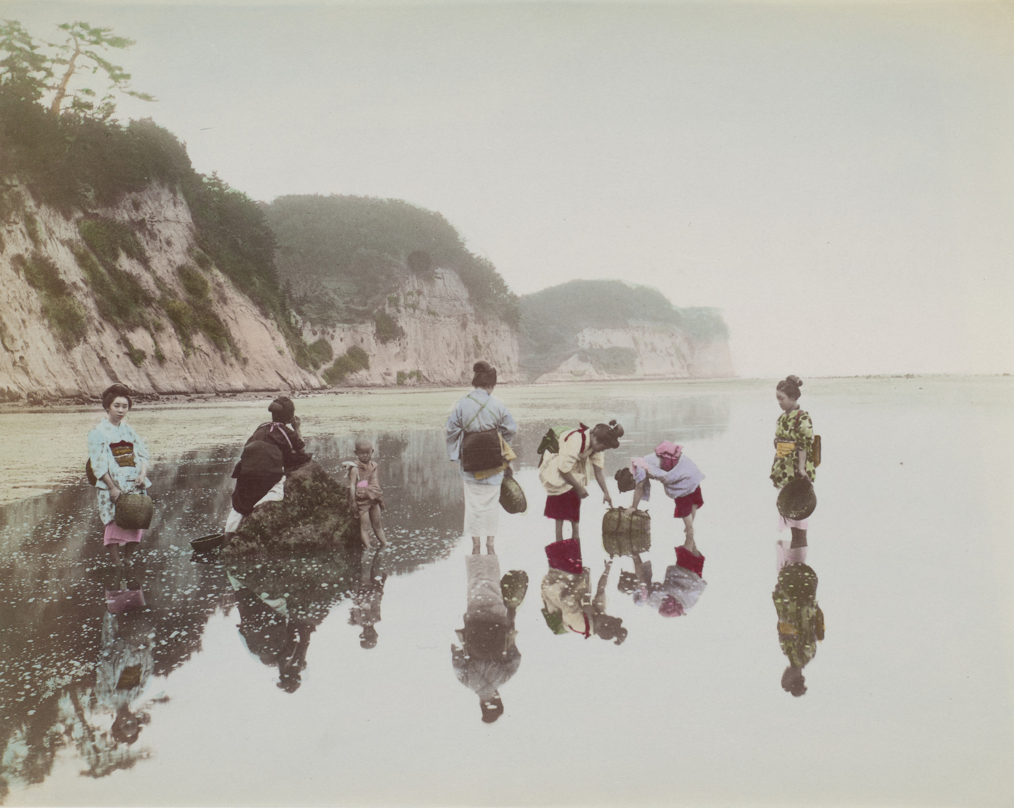 Unidentified photographer. Untitled (women with baskets in a river)