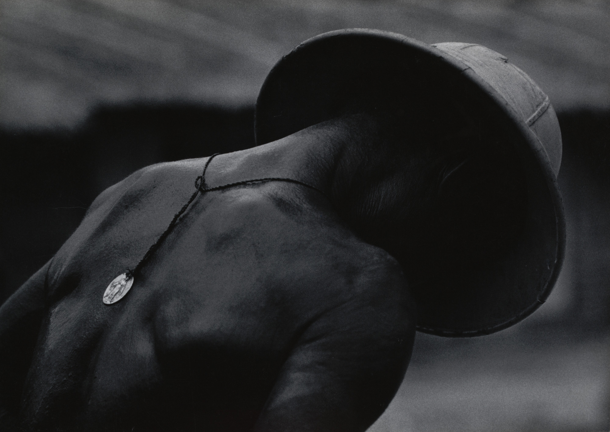 W. Eugene Smith. Leper Patient and Religious Medal at Dr. Albert Schweitzer's