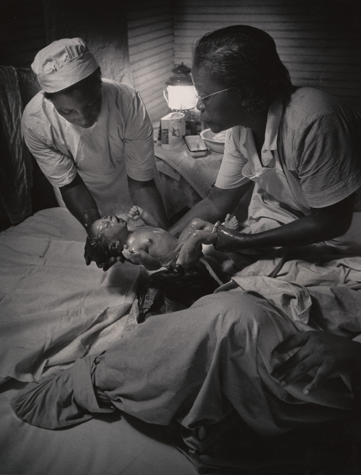 W. Eugene Smith. Nurse Midwife Maude Callen Delivers a Baby, Pineville, South Carolina