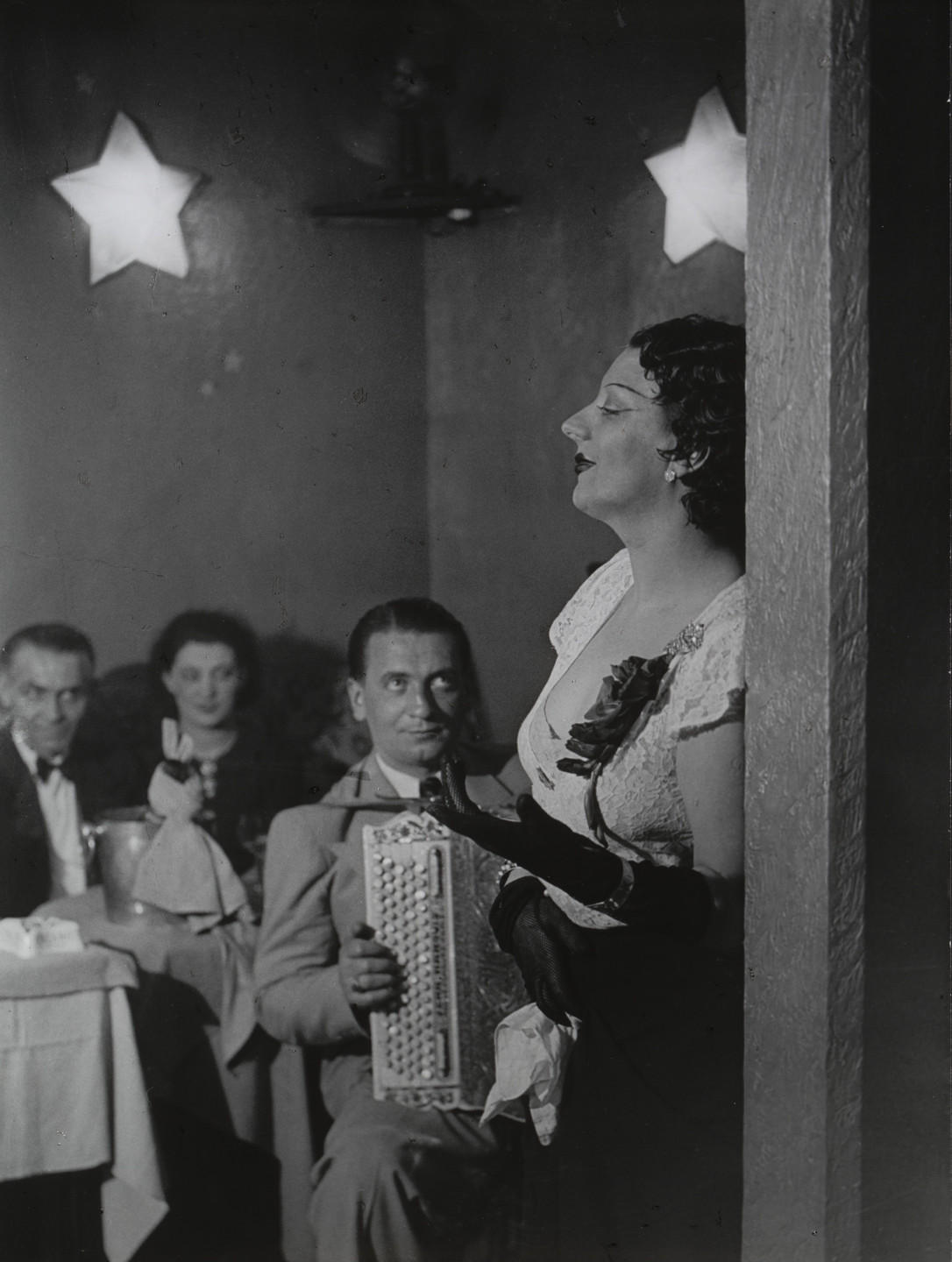 Brassaï (Gyula Halász). Kiki Singing at the Cabaret des Fleurs, Boulevard Montparnasse. 1932