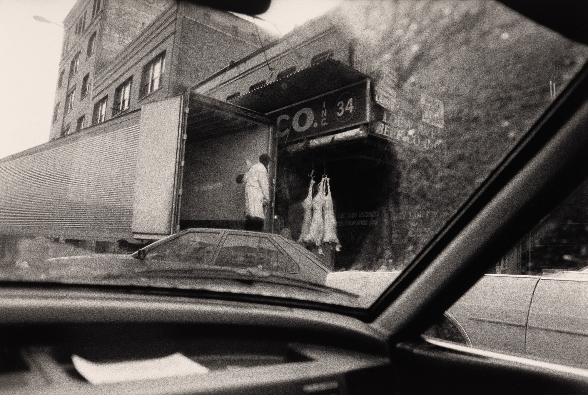 Sylvia Plachy. 14th Street, Meat Market. 1987