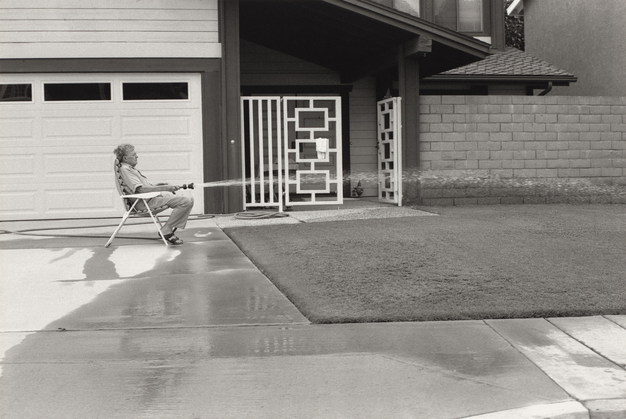 Ed Templeton, Deanna Templeton. Man Waters Lawn, Huntington Beach