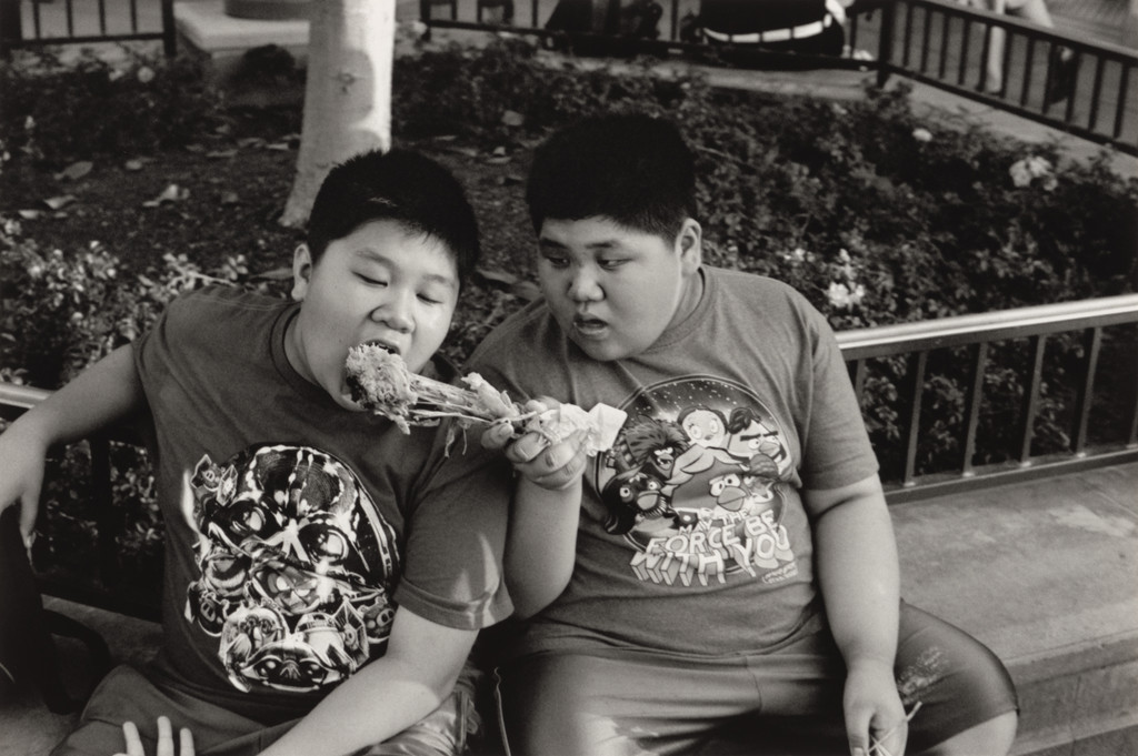 Two boys eating, Disneyland