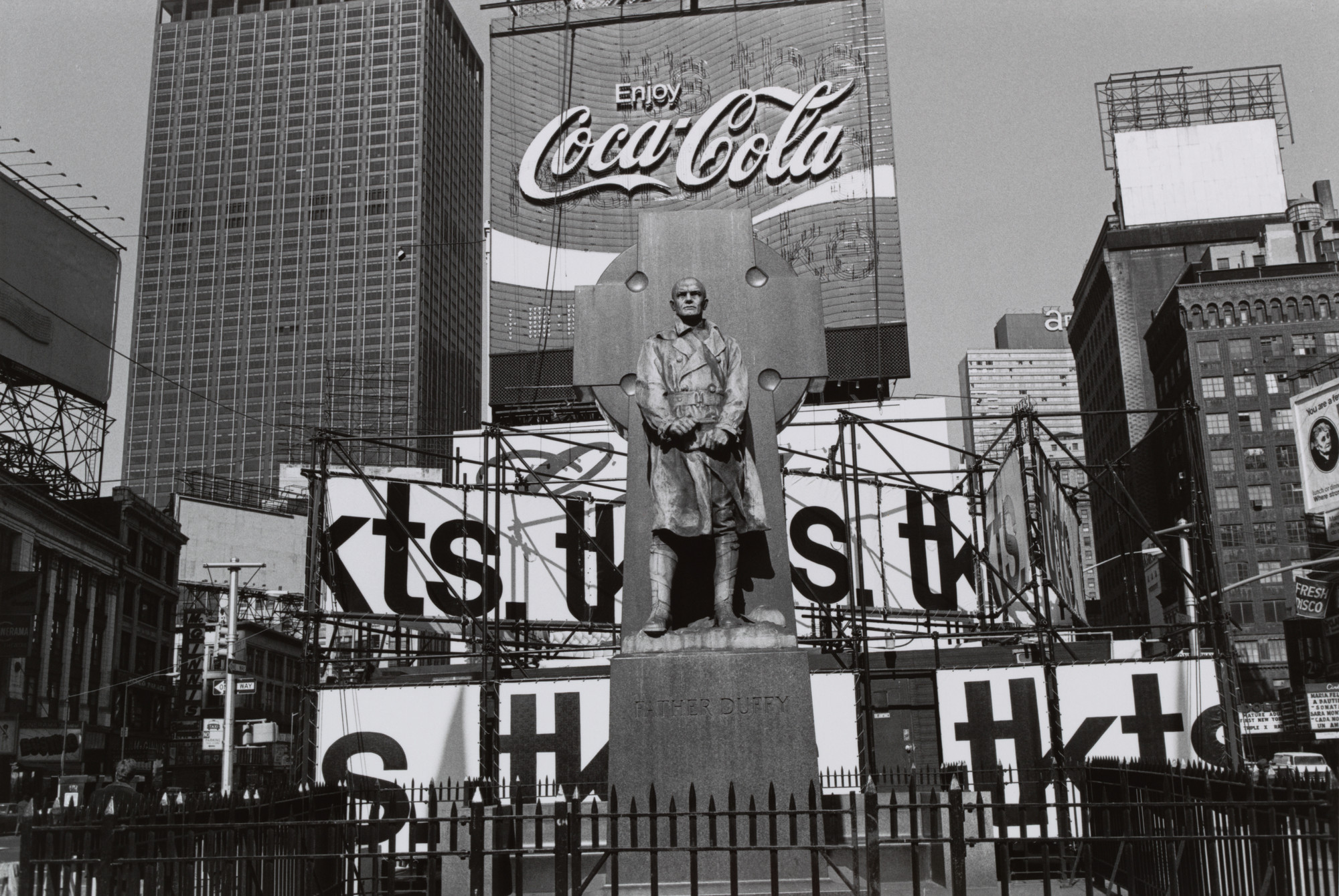 Lee Friedlander. Father Duffy. Times Square, New York City. 1974