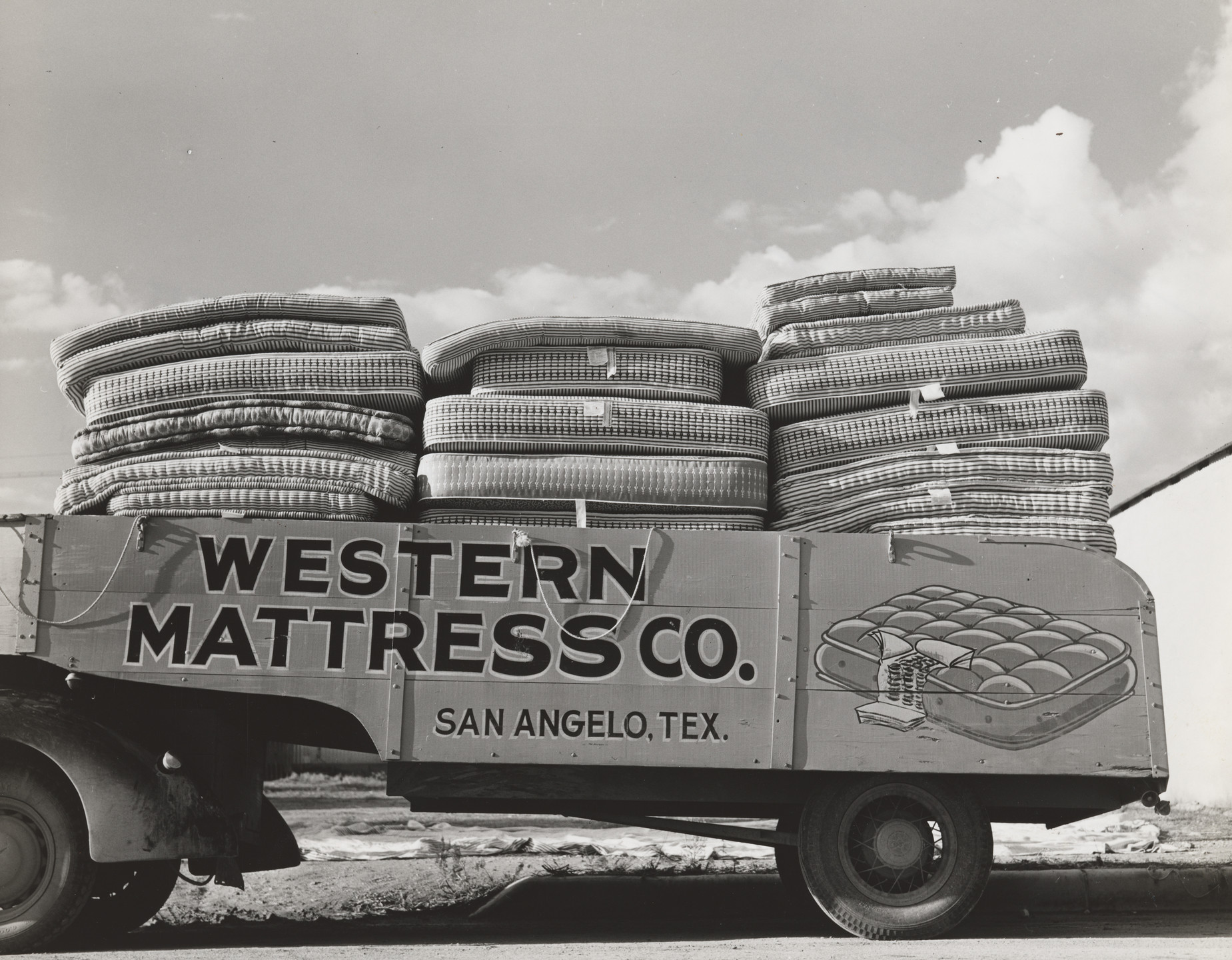 Russell Lee. Truck Filled with Mattresses. This Mattress Company Uses these Trucks to Distribute its Products Throughout Texas. San Angelo, Texas. 1939