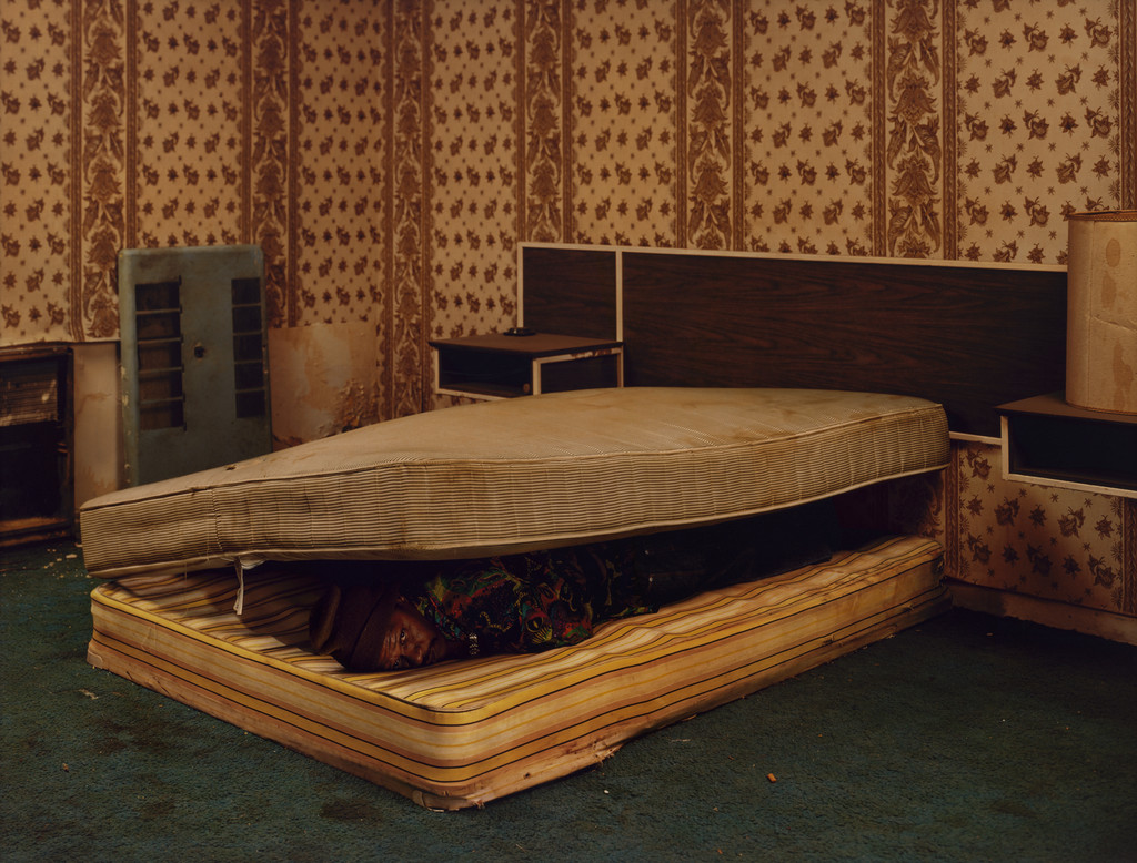 Larry Mayes. Scene of Arrest, The Royal Inn, Gary, Indiana. Police Found Mayes Hiding beneath a Mattress in this Room. Served 18.5 Years of an 80-Year Sentence for Rape, Robbery and Unlawful Deviate Conduct from the series The Innocents