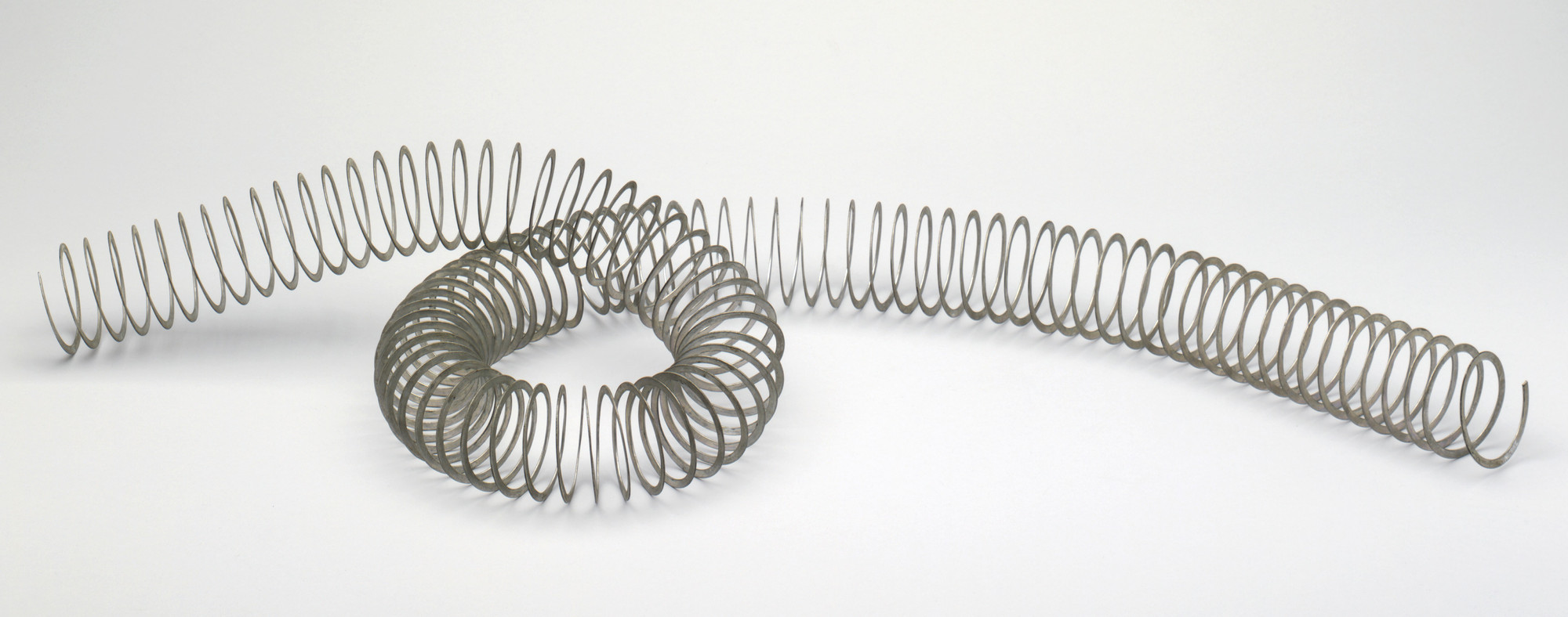 American Steel &amp; Wire Co., Worcester, MA. Coil of Strip Stainless Steel. Before 1934